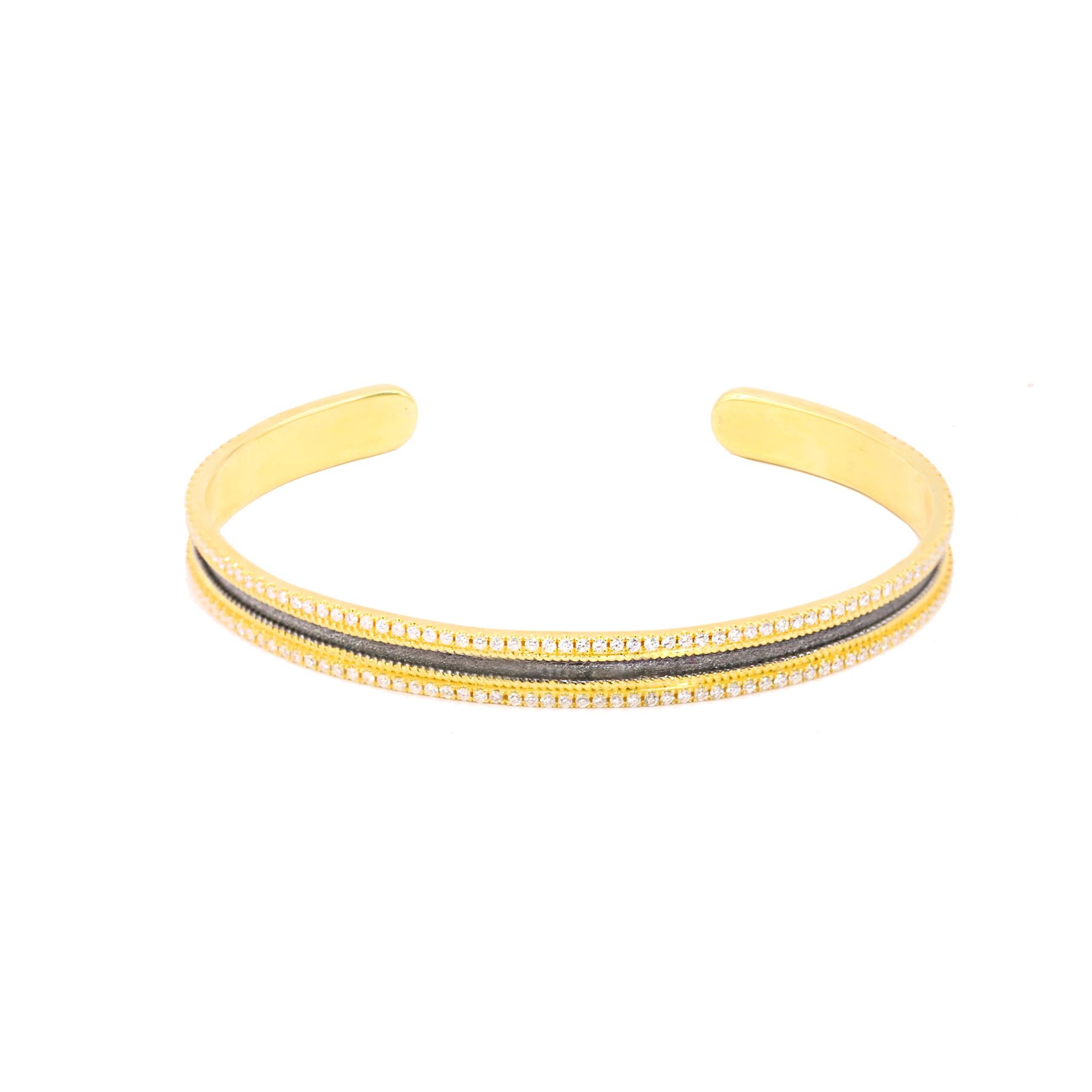 Der Designer S.Georgios präsentiert einen exquisiten Armreif aus 18 Karat Gelbgold mit schwarzer Rhodiumoberfläche. Dieses schmale Armband ist mit zwei Reihen von Diamanten im Brillantschliff mit einem Gesamtgewicht von 1,19 Karat verziert, die