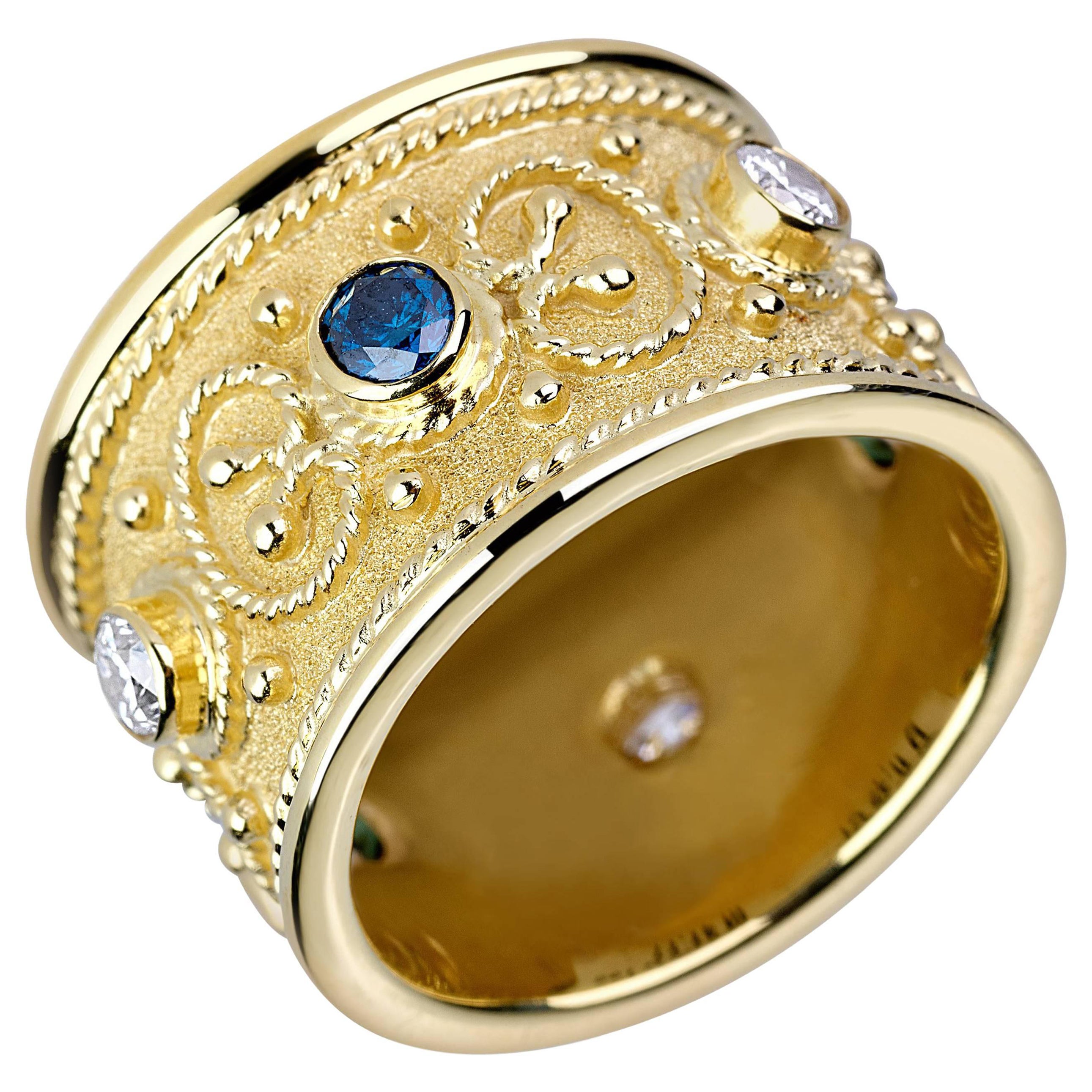 Anello a fascia larga con diamante bianco e blu in oro giallo 18 carati Georgios Collections