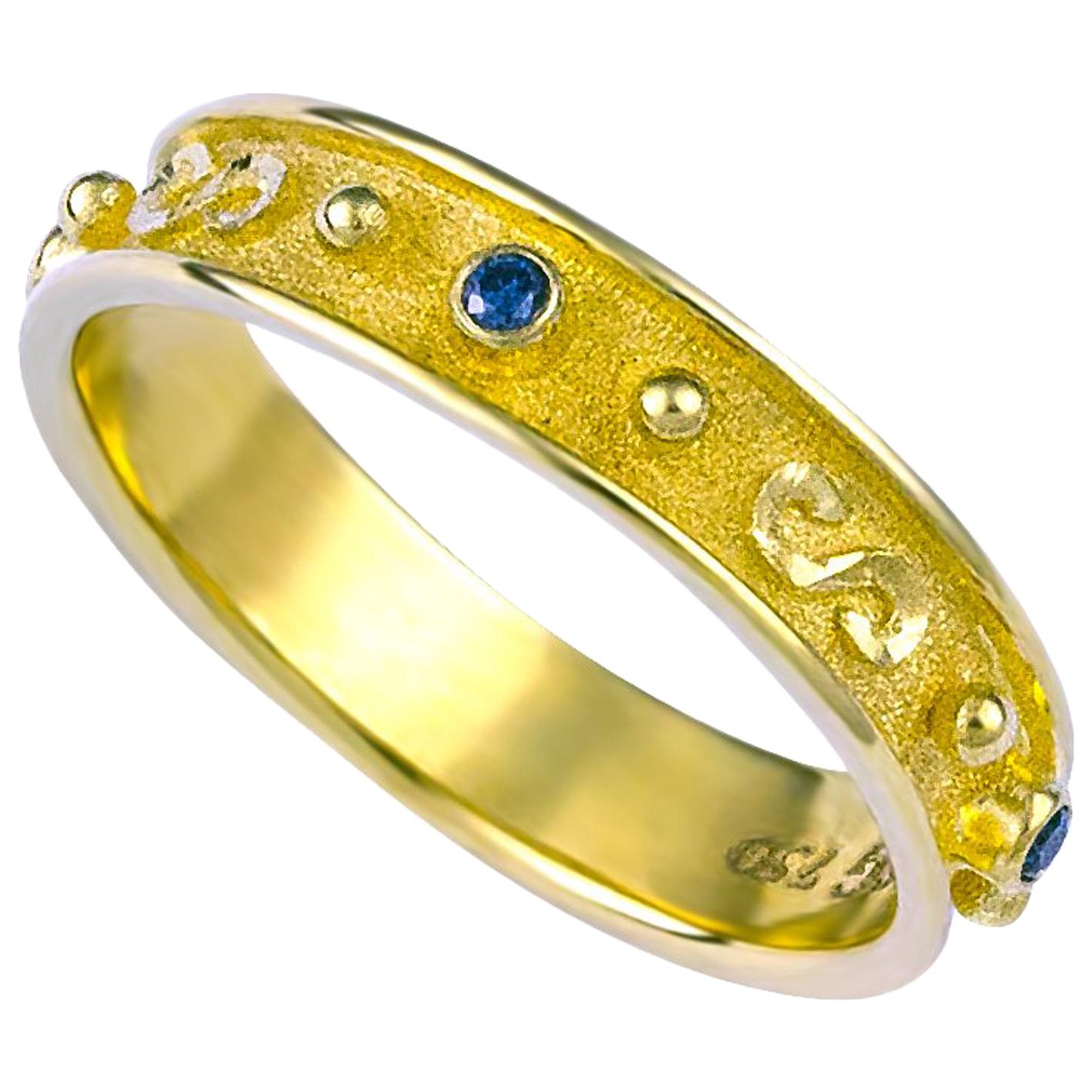 Colecciones Georgios Anillo Granulado de Oro Amarillo de 18 Quilates con Diamante Azul