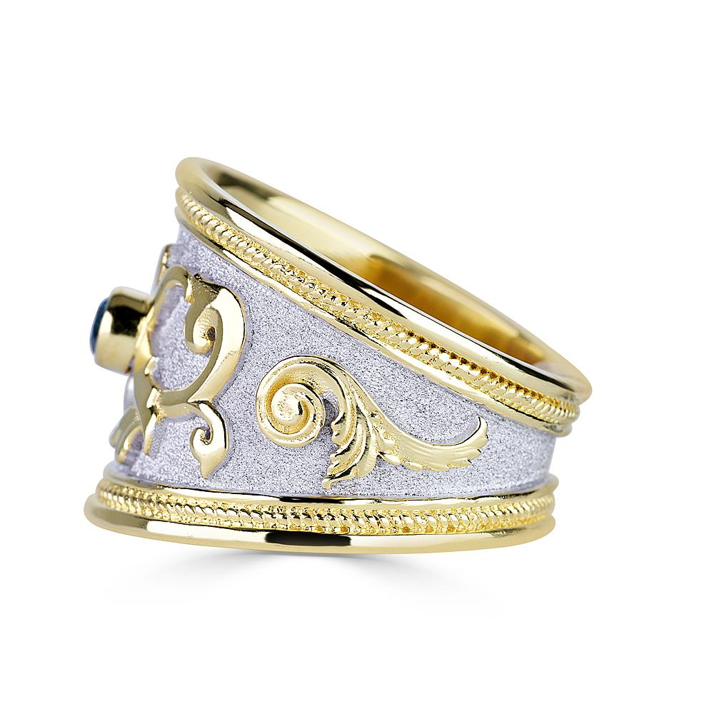 S.Georgios designer ring is all handmade from solid 18 Karat Yellow Gold and custom-made. The stunning ring has Granulation work microscopically decorated and a unique Byzantine velvet background finished with White Rhodium. This beautiful piece