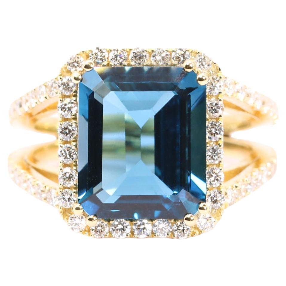 Georgios Collections Anillo de oro amarillo de 18 quilates con topacio azul y diamantes