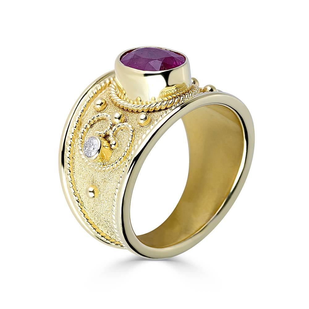 S.Georgios designer 18 Karat Solid Yellow Gold Ring all handmade with the Byzantine Style workmanship and a unique velvet background look. The stunning ring features a 3.03 Carat Natural Ruby and 2 Brilliant cut White Diamonds total weight of 0.16
