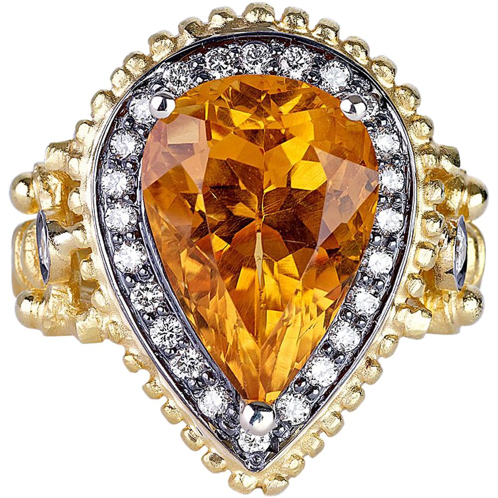 S.Georgios designer ring is all handmade from solid 18 Karat Yellow Gold and custom-made. The gorgeous ring is microscopically decorated with gold beads. Granulated details in Byzantine style compliment a Center 8.01 Carat Pear Cut Citrine. The