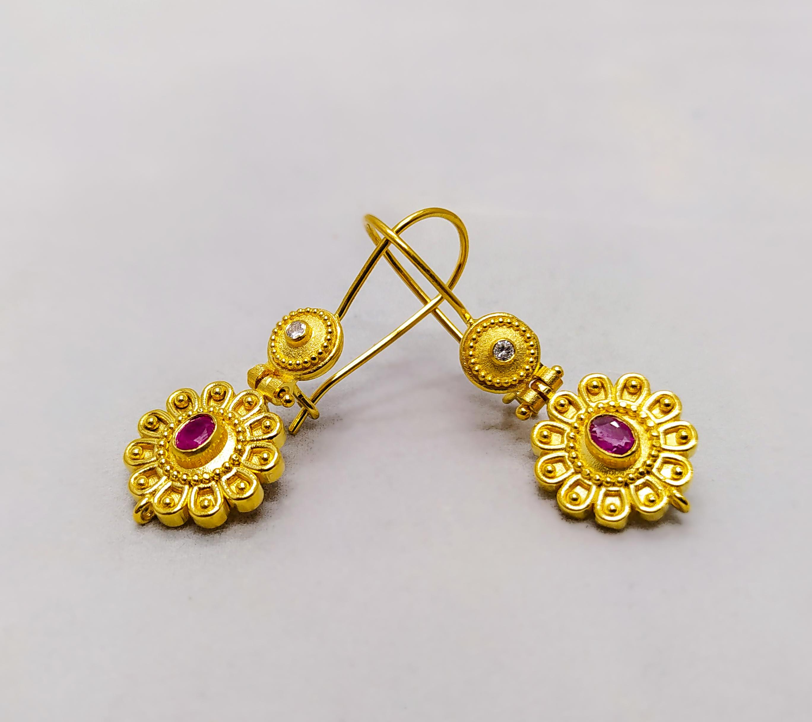 S.Georgios 18 Karat Yellow Gold gorgeous designer earrings are decorated with hand-made Byzantine-era style bead granulation workmanship done all microscopically and finished with a unique velvet background. These beautiful floral earrings feature 2