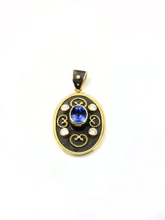 Collana con ciondolo in oro giallo 18 carati con tanzanite e diamanti di Georgios Collections