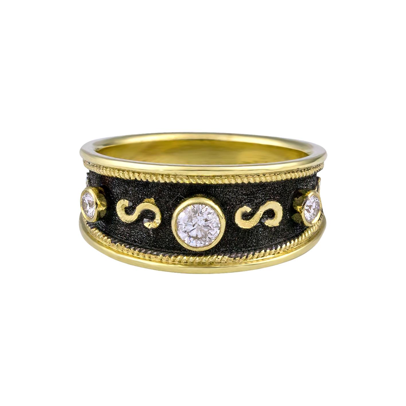 S.Georgios design ring handmade from solid 18 Carat Yellow Gold. This graduated ring is microscopically decorated with gold wires. Granulated details contrast with Byzantine velvet background finished with Black Rhodium. The gorgeous piece features
