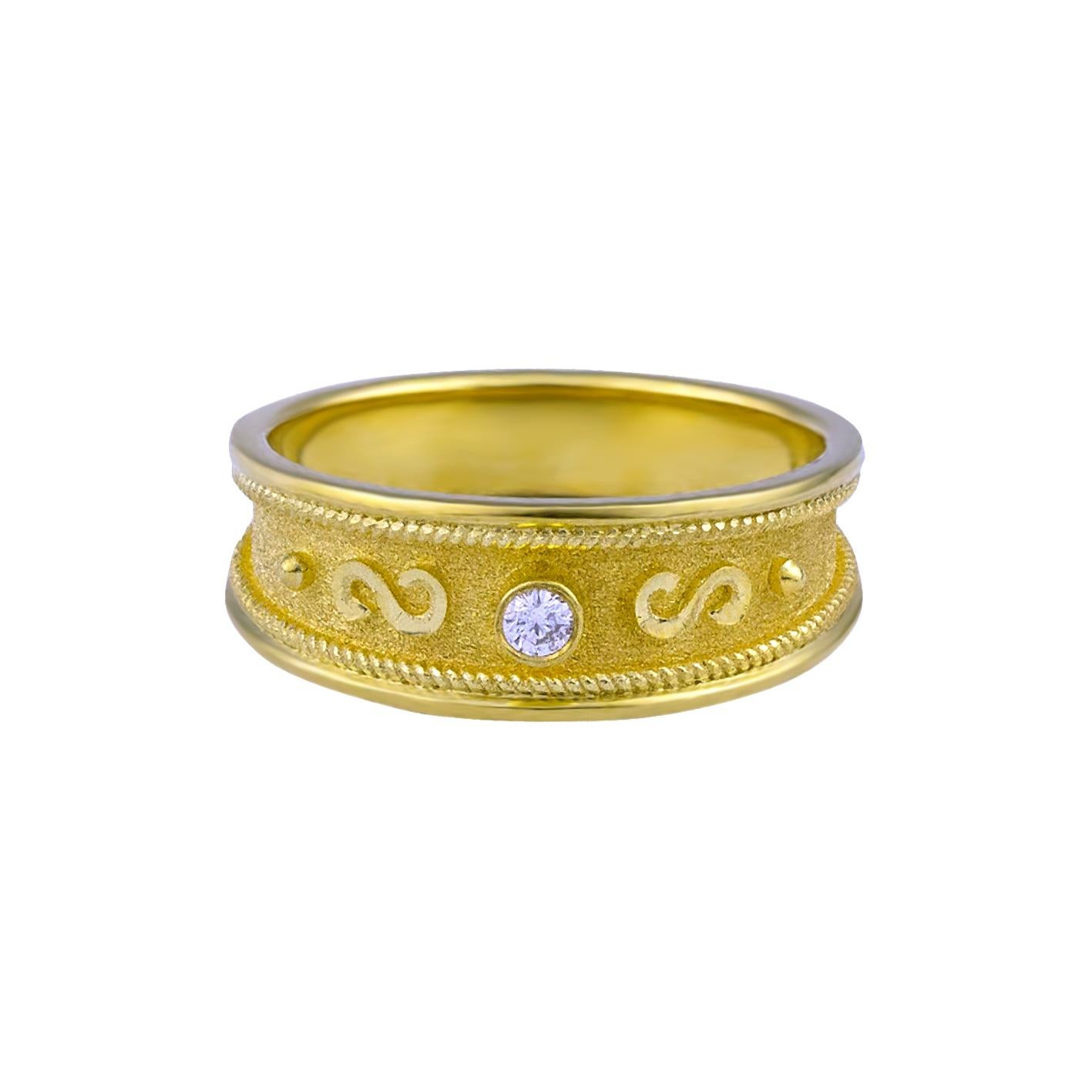 S.Georgios designer Band Ring is handmade from solid 18 Karat Yellow Gold all custom-made. This stunning ring is microscopically decorated with gold wires -granulated details contrast with Byzantine velvet finish on the background. The ring features