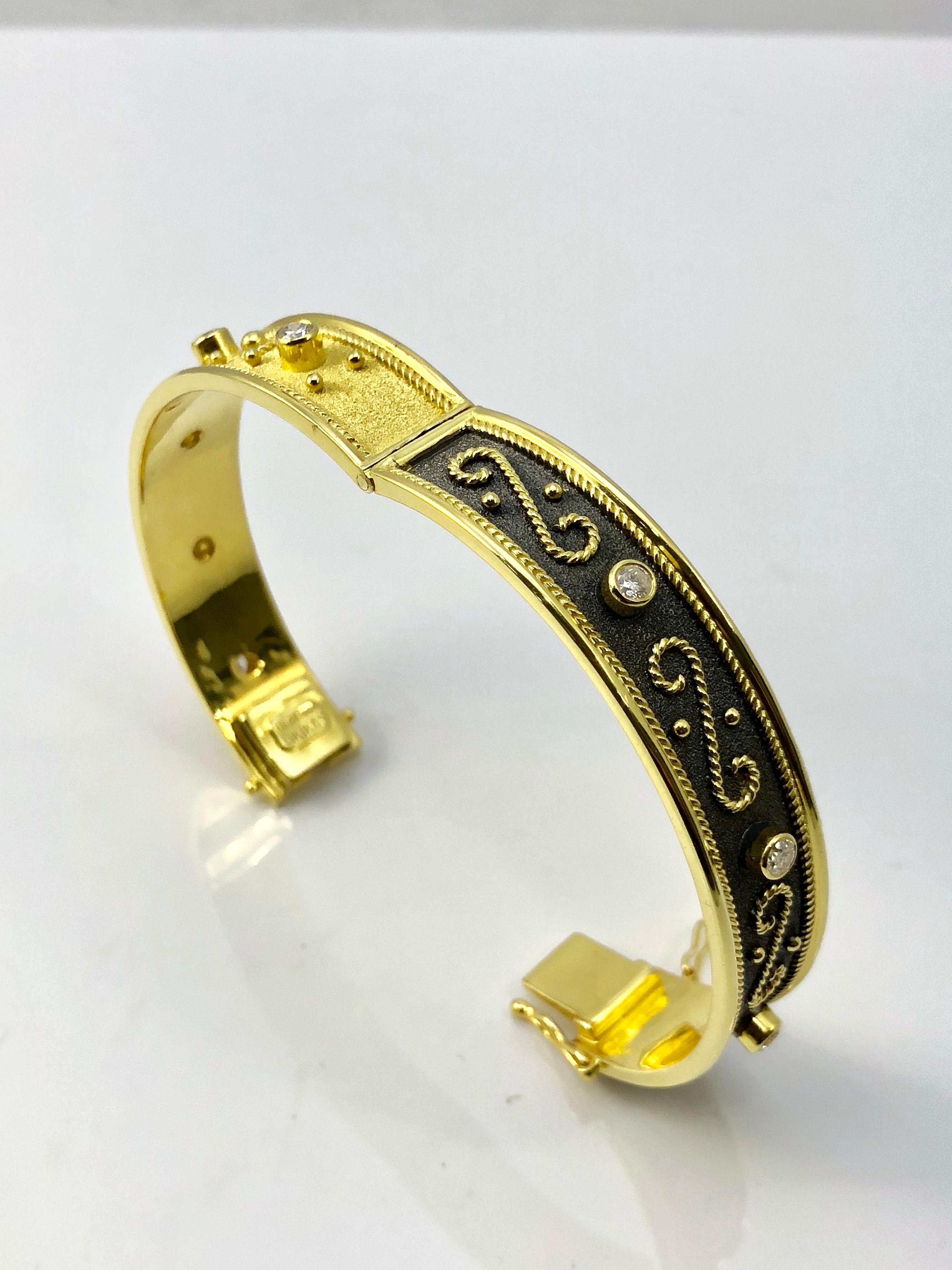 S.Georgios designer Bangle Bracelet Hand Made in 18 Karat Yellow Gold all custom-made. This gorgeous bracelet is microscopically decorated with granulation work in Byzantine style - and on one side has the  