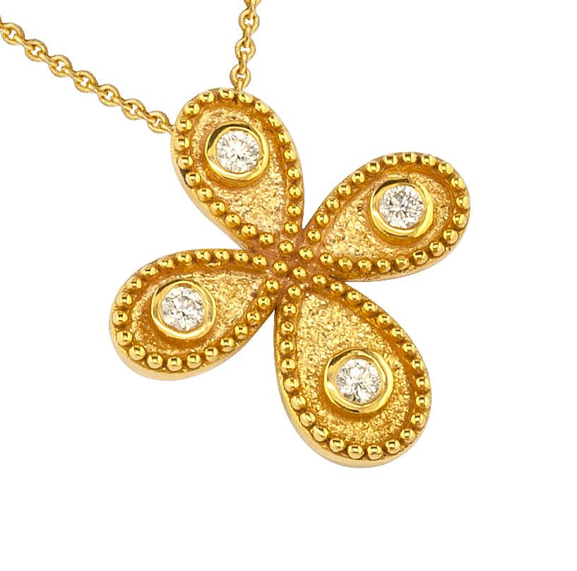 S.Georgios designer Cross pendant Necklace is all handmade from solid 18 Karat Yellow Gold and is microscopically decorated with granulation work all the way around. The background of this gorgeous Cross has a unique velvet look and features 4