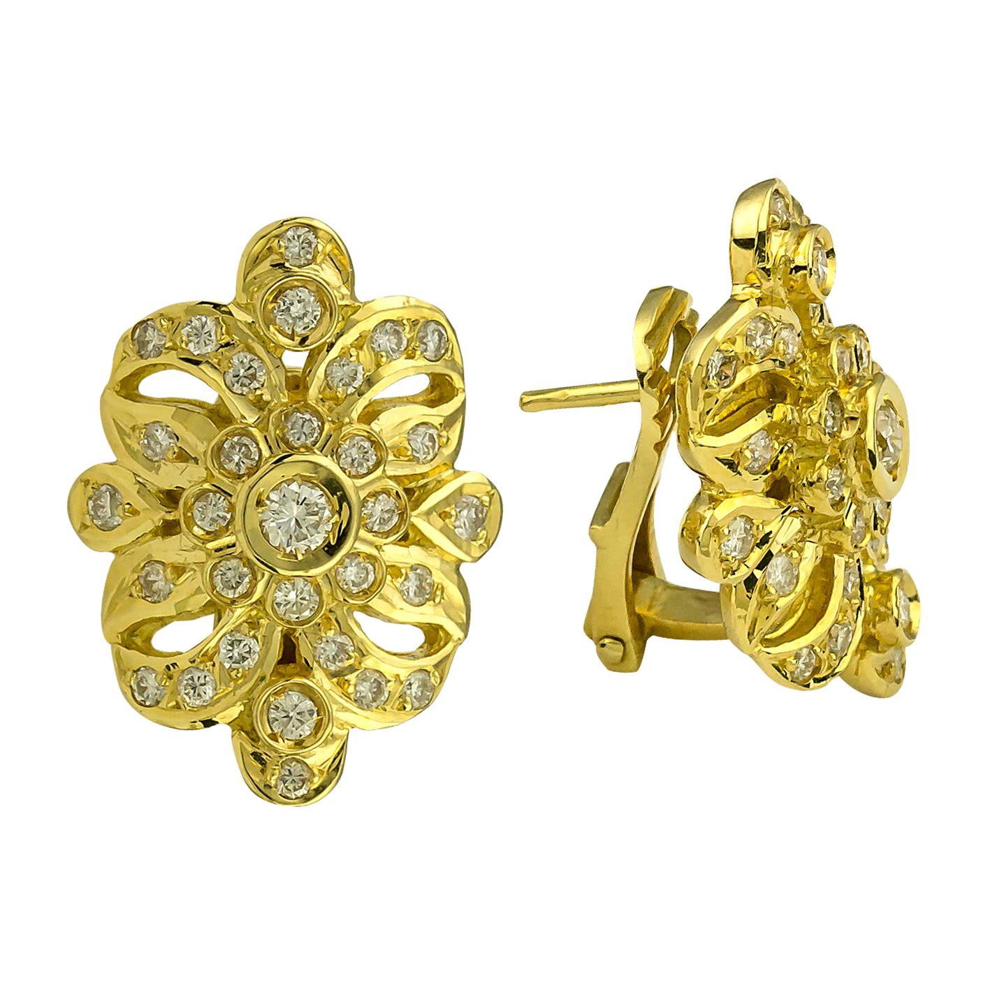 S.Georgios Earrings are Hand Made from 18 Karat Yellow Gold and are decorated with Byzantine-era style workmanship and feature Brilliant cut Diamonds total weight of 1,14 Carats. This unique pair of earrings can be also adjusted to be only a clip.