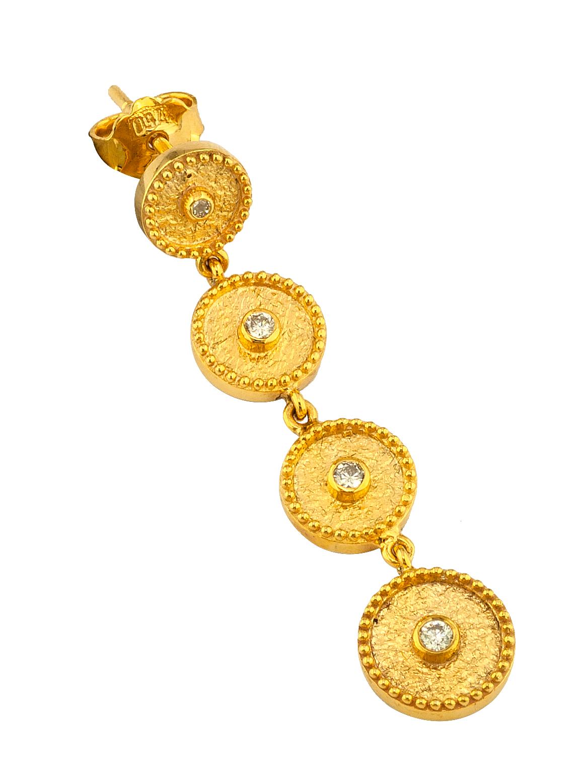 These S.Georgios designer earrings are hand made from 18 Karat Yellow Gold and decorated with Byzantine-era style granulation workmanship done microscopically. This stunning pair of dangle earrings features 8 brilliant-cut natural White Diamonds