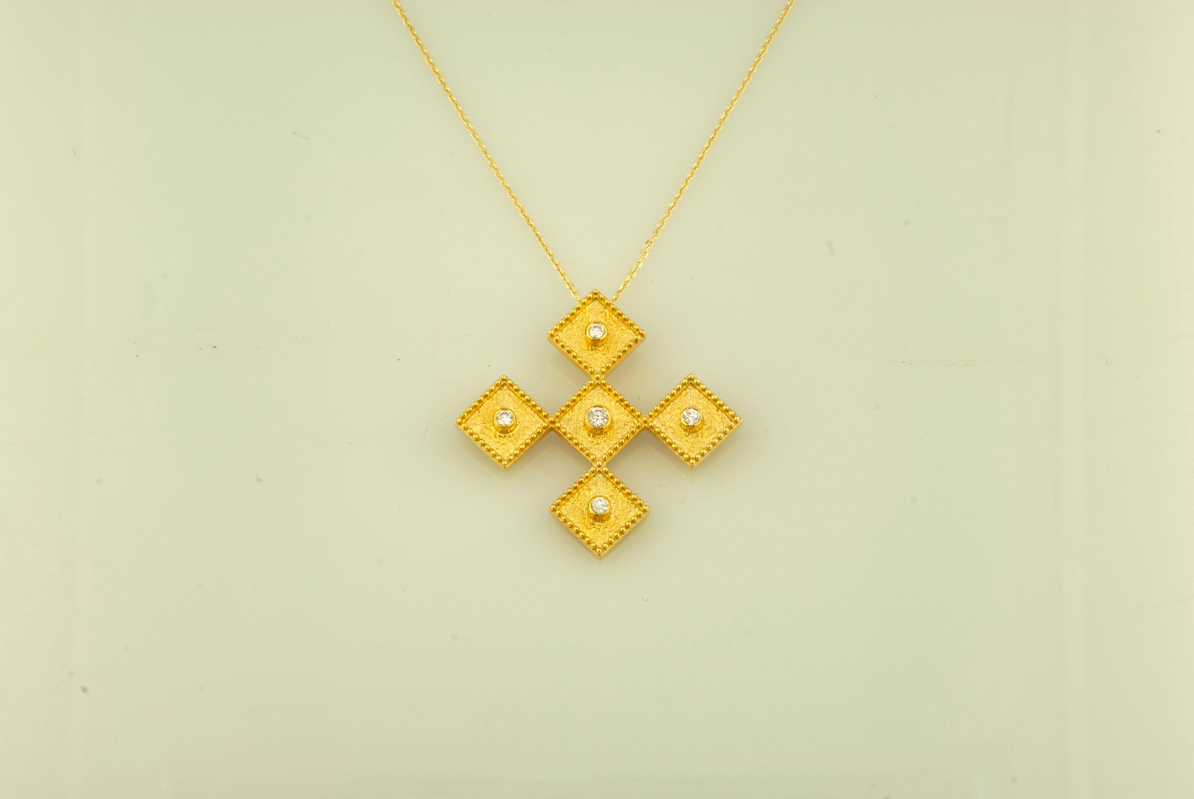This S.Georgios designer 18 Karat Gold Rhombus shaped cross pendant necklace and chain is handmade with microscopically decorated Byzantine-style granulation work and is finished with a unique velvet background look. This gorgeous cross pendant