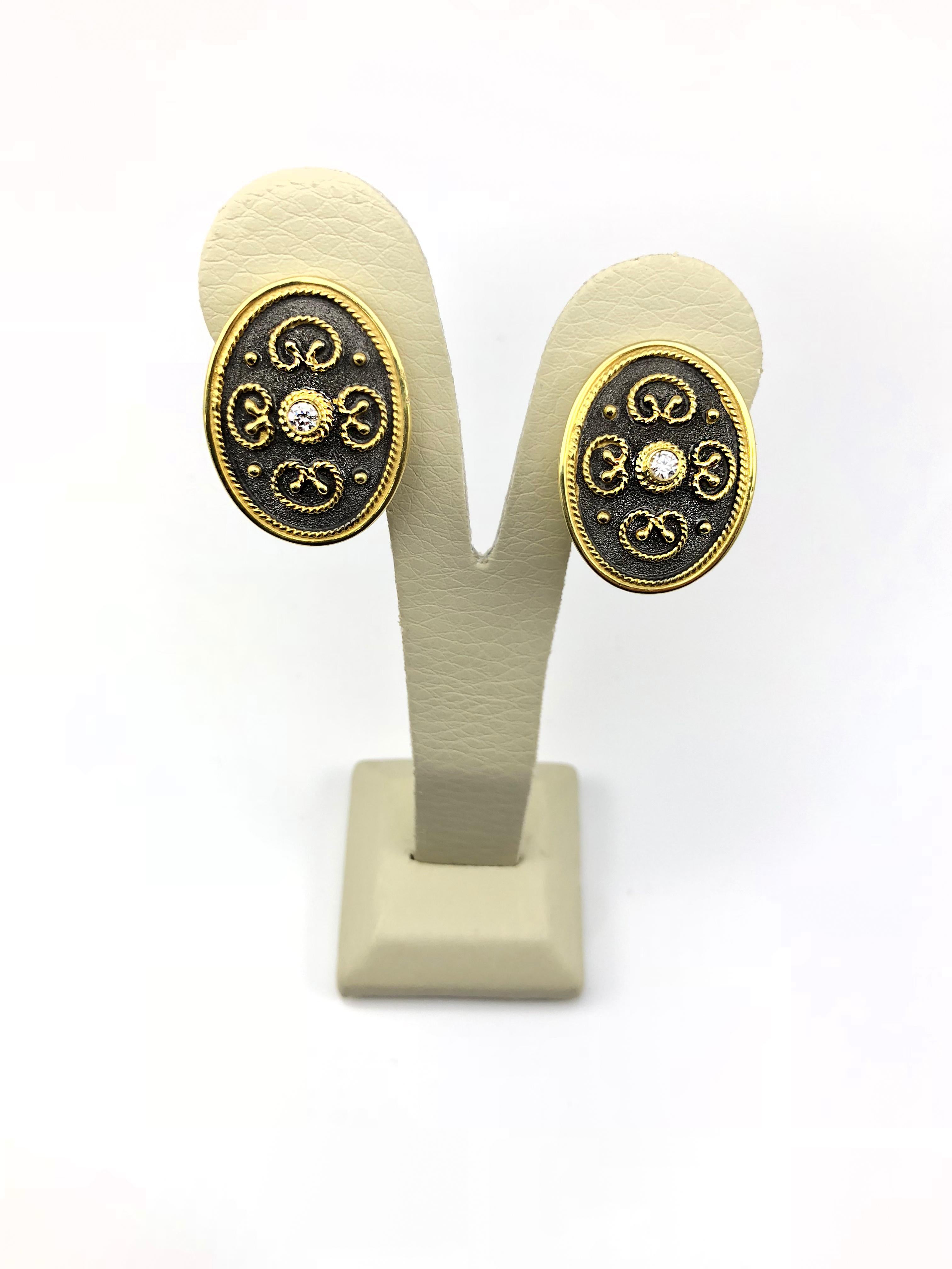 S.Georgios designer earrings are handmade from solid 18 Karat Yellow Gold and all custom-made. The stunning earrings are microscopically decorated with granulation -beads, and wires. Granulated details contrast with Byzantine velvet background in
