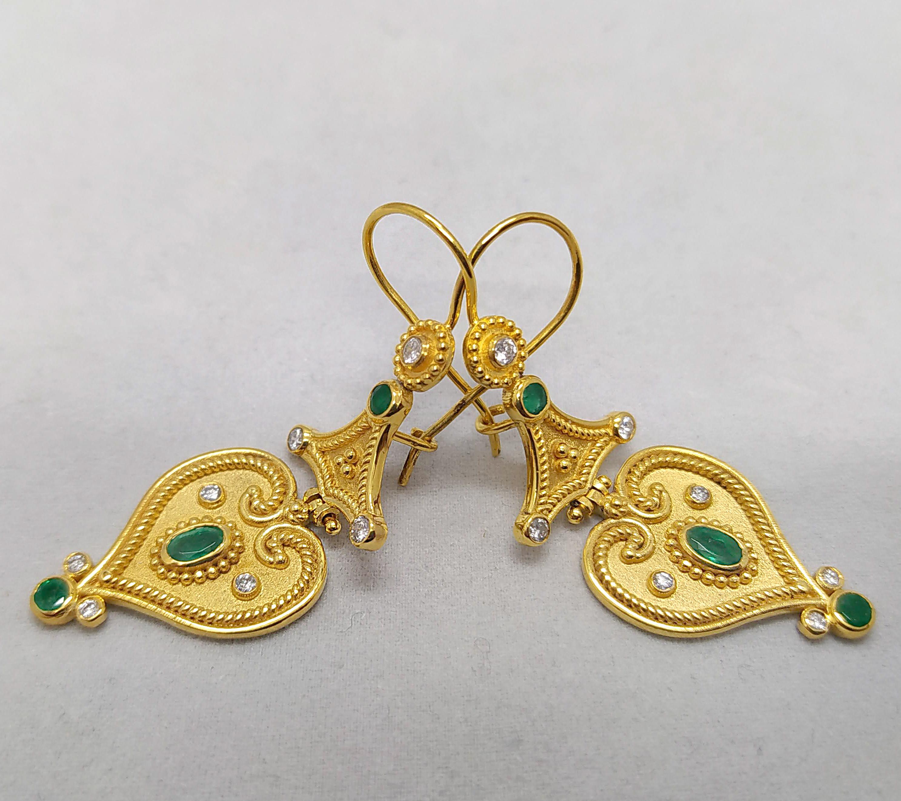 These S.Georgios 18 Karat Yellow Gold gorgeous designer earrings are decorated with hand made Byzantine-era style bead granulation workmanship done all microscopically, and finished with a unique velvet background. These beautiful heart shape