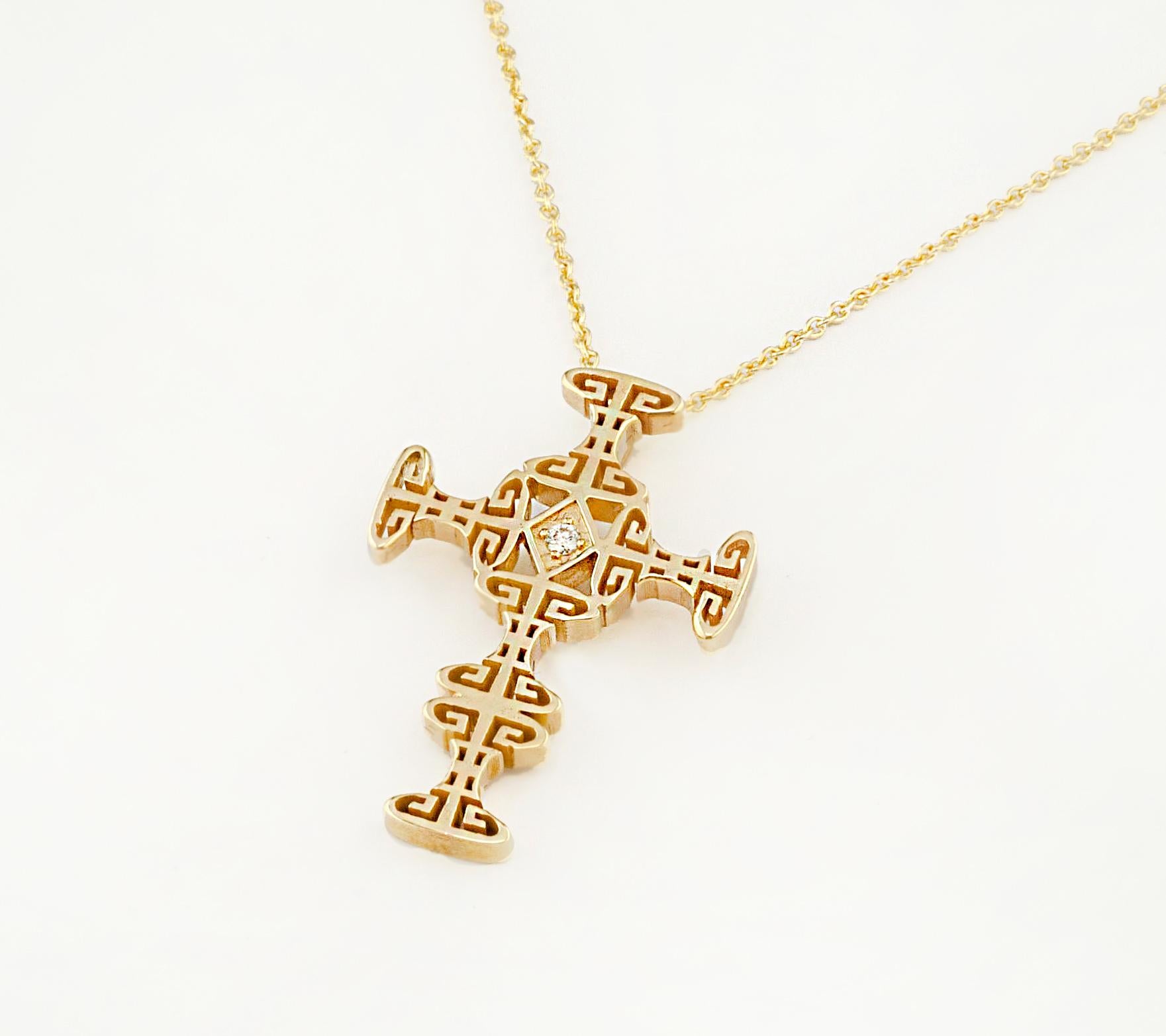This S.Georgios Cross pendant is all handmade from solid 18 Karat Yellow Gold and is microscopically decorated with granulation work all the way around. The gorgeous and unique piece has carved the Omega -the last letter of the Greek alphabet all