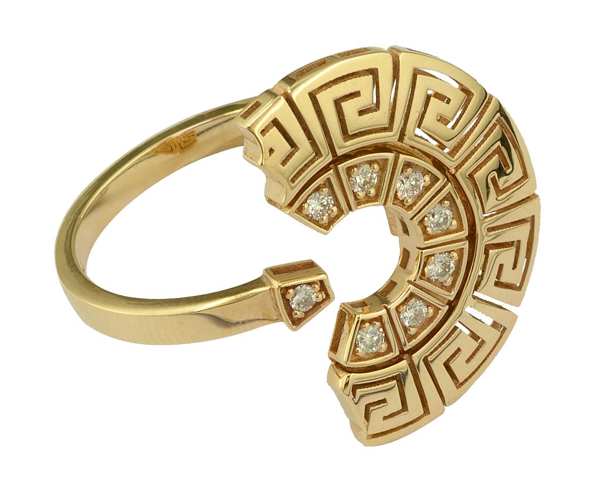 This S.Georgios designer ring is handmade from solid 18 Karat Yellow Gold and is microscopically carved to a unique Greek design to form a stunning fragmented shield look. This beautiful ring features 8 brilliant-cut White Diamonds with a total