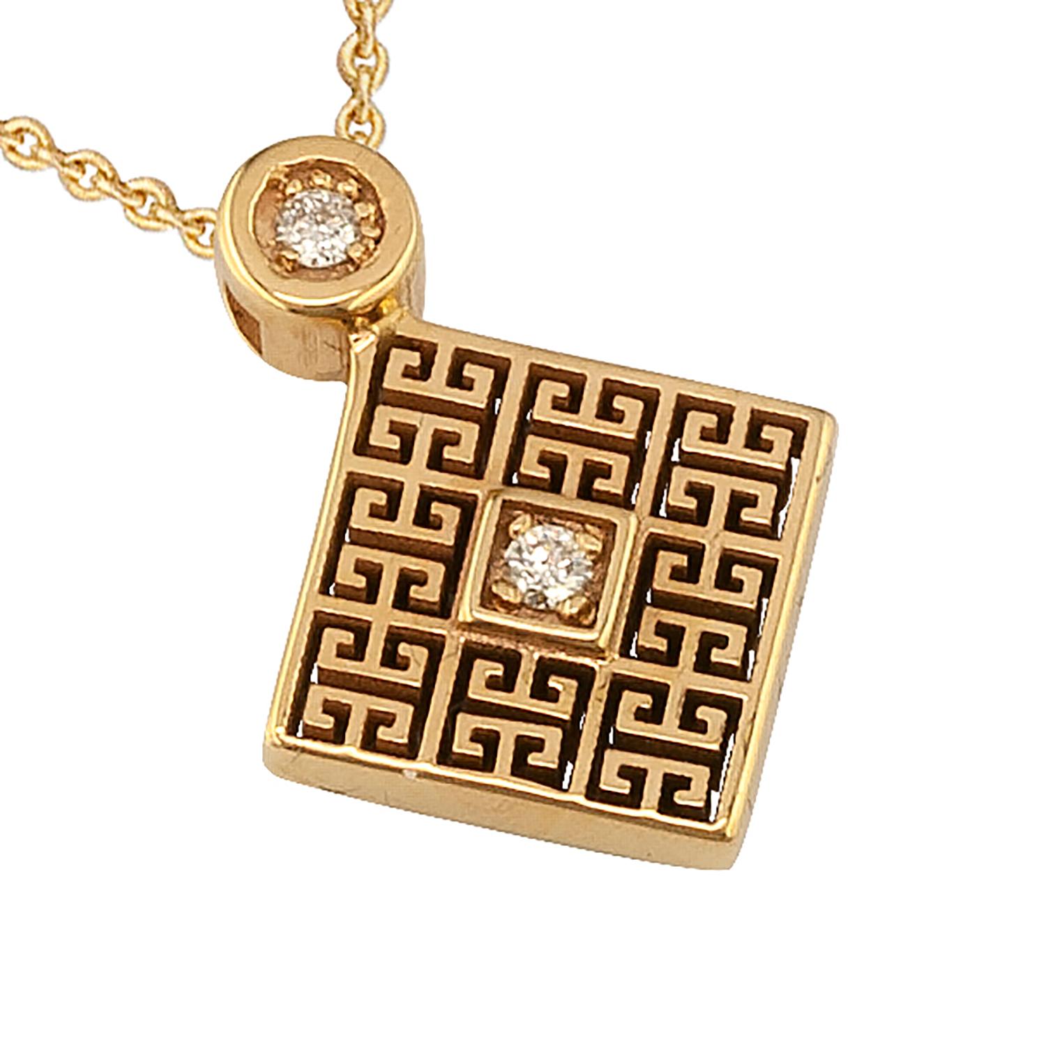 S.Georgios designer pendant enhancer and chain is handmade from solid 18 Karat Yellow Gold and carved forming a Greek Key design, which is the symbol of eternity. This stunning pendant features 2 brilliant-cut White Diamonds with a total weight of