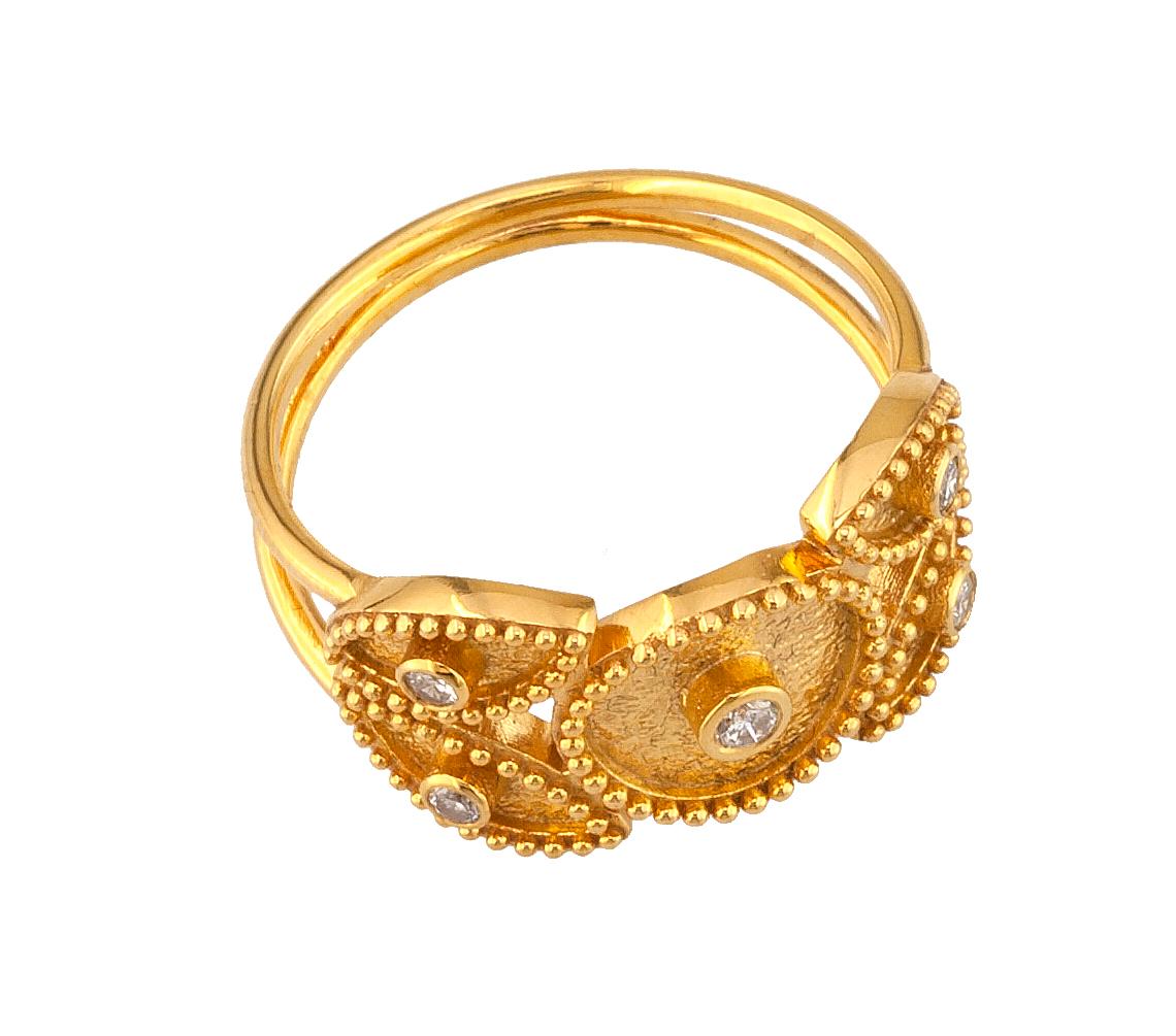 This S.Georgios designer band ring is 18 Karat yellow gold and microscopically decorated with hand-made granulation workmanship, and finished with a unique contrast velvet look. This beautiful band ring features 5 brilliant-cut White Diamonds total