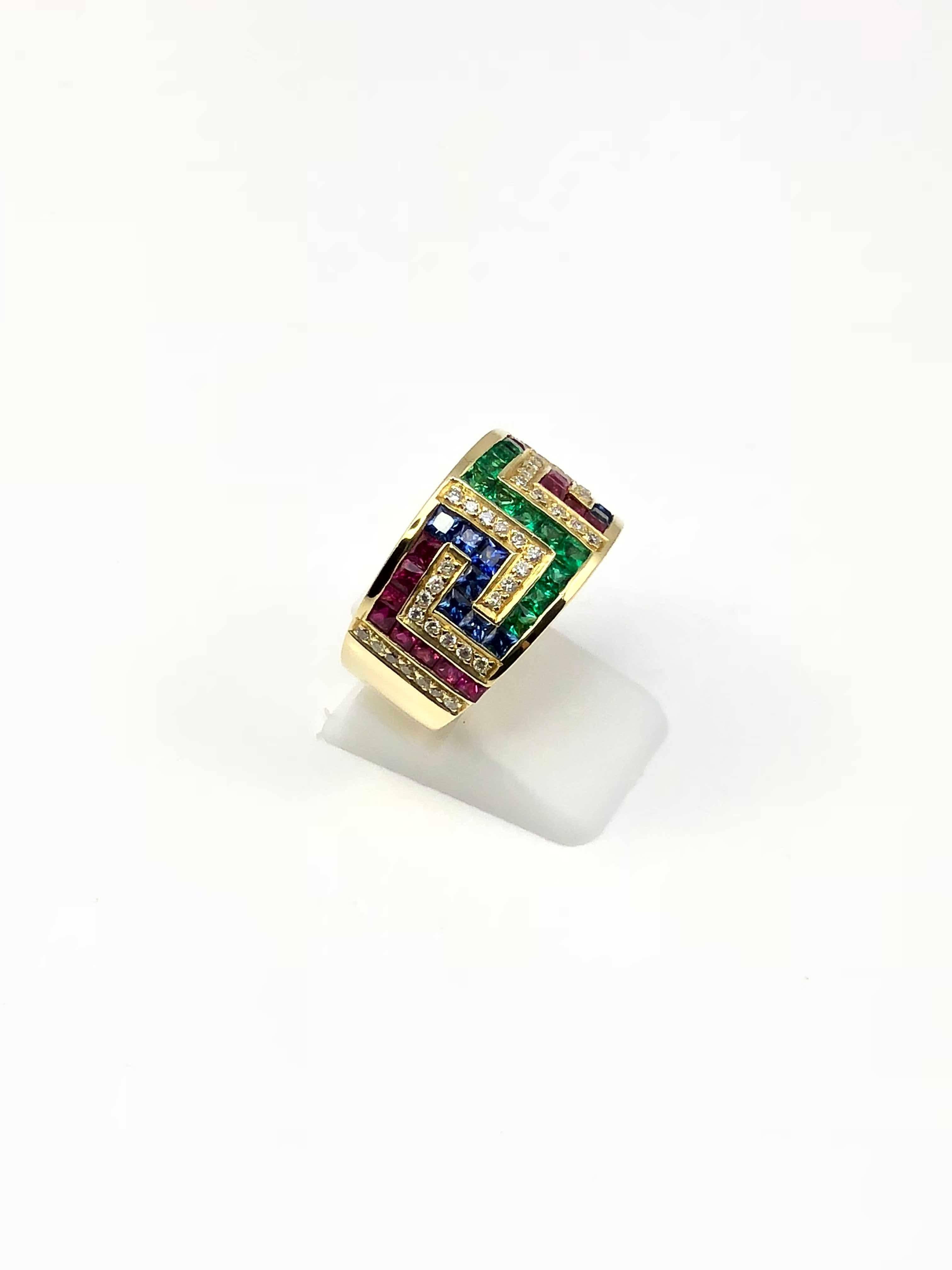 S.Georgios designer 18 Karat Yellow Gold Ring all Hand-Made featuring the Greek Key design symbolizing eternity. This gorgeous band ring features Brilliant Cut White Diamonds total weight of 0.40 Carat, Princess cut Rubies, Sapphires and Emeralds