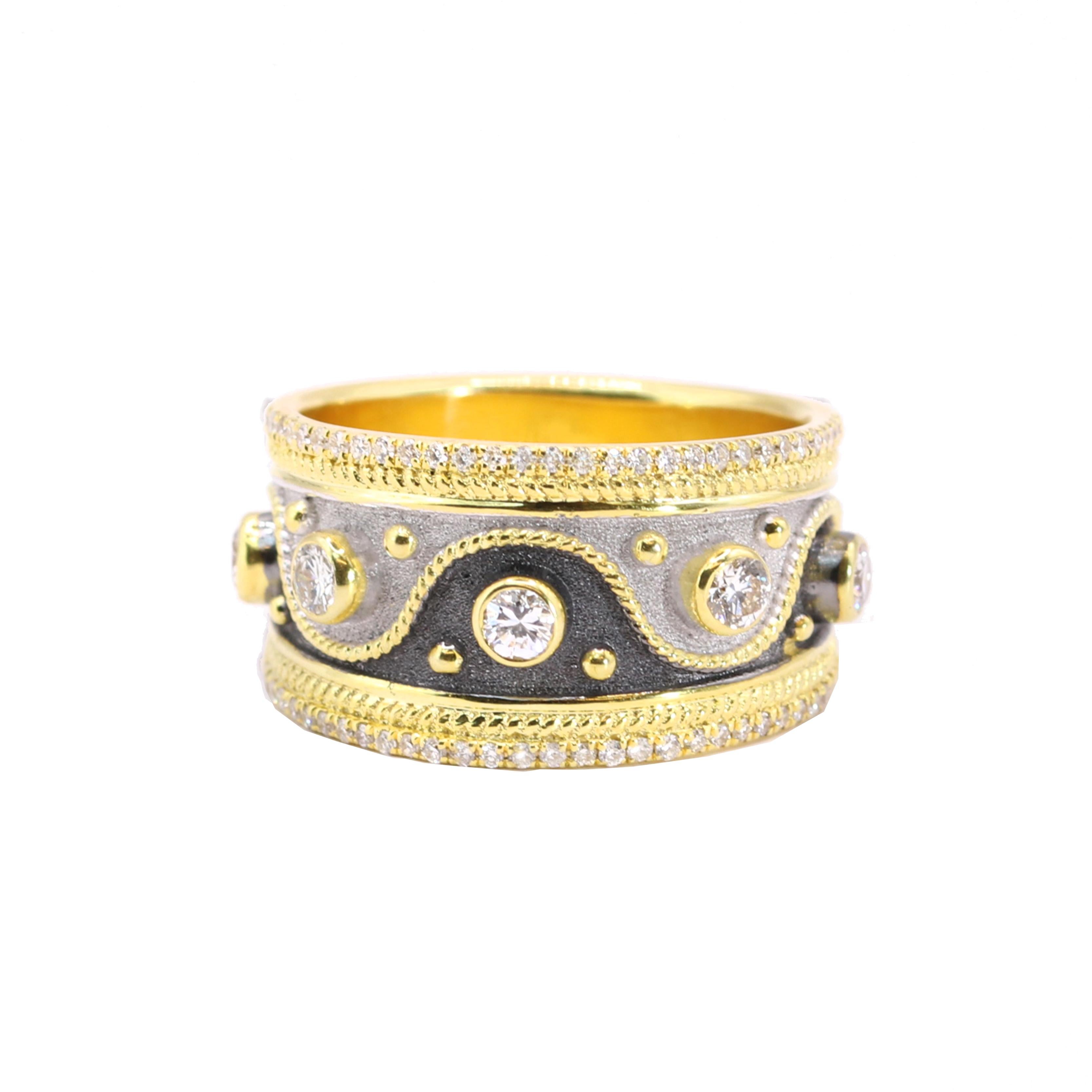 You are admiring the S.Georgios designer ring all handmade from solid 18 Karat yellow gold and microscopically decorated all the way around with gold wires. The unique velvet background typical for Byzantine Era is finished with black and white