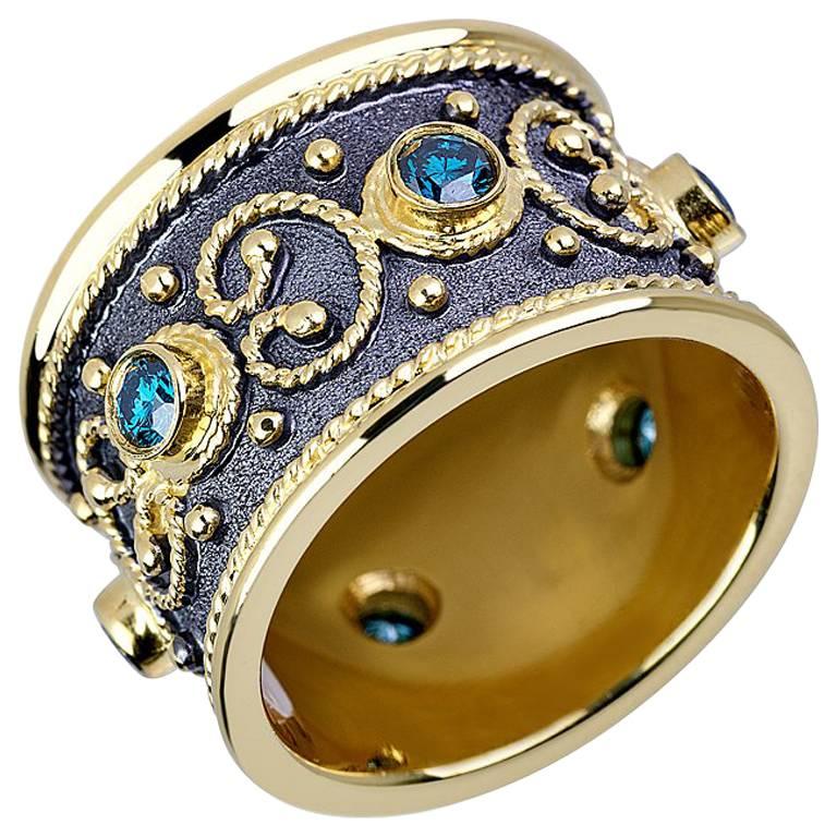 Georgios Collections: 18 Karat Gelbgold Diamantbandring mit blauen Diamanten