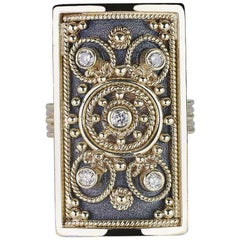 Anello con diamante in oro giallo 18 carati Georgios Collections con lavorazione granulare.