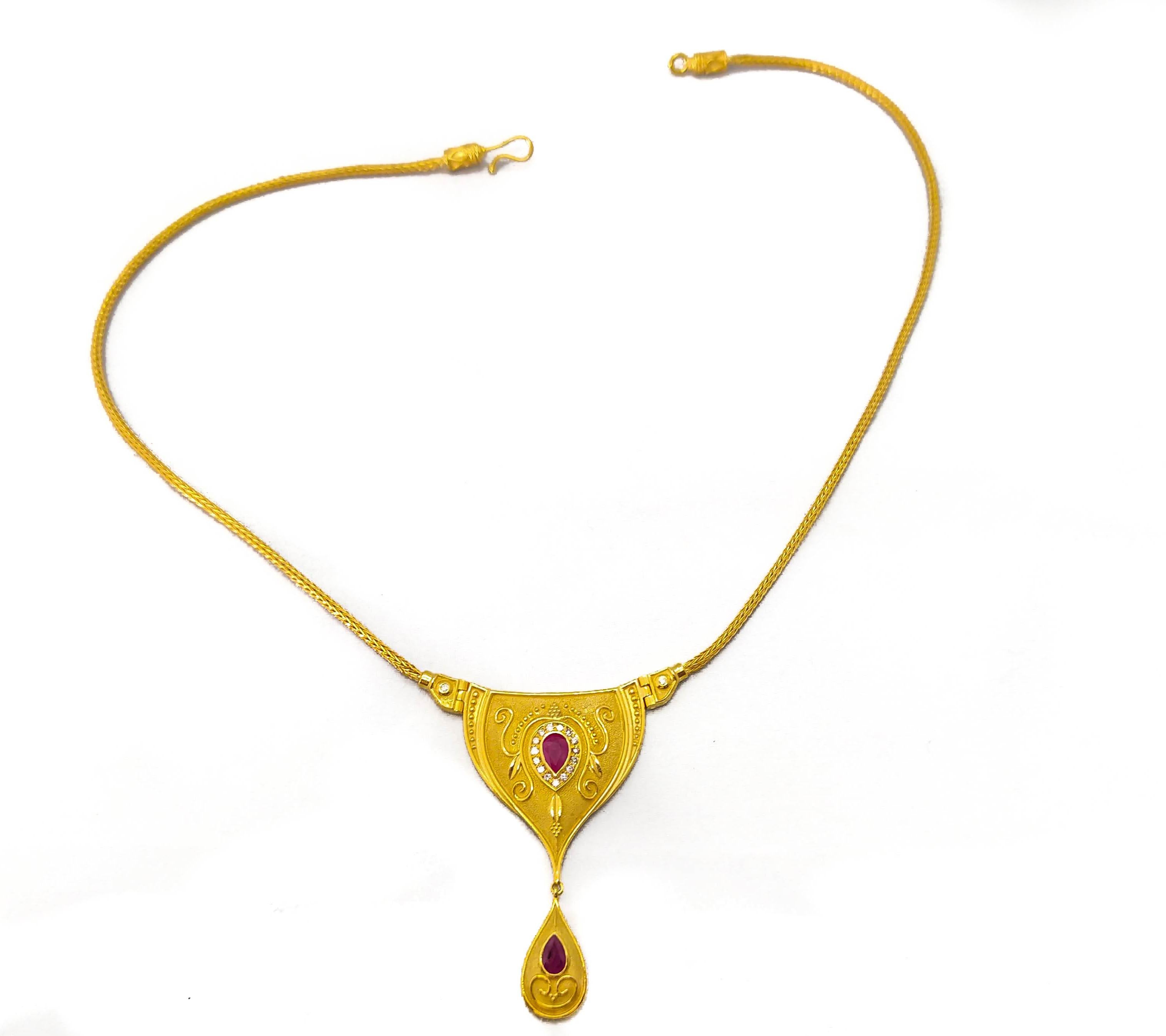 This S.Georgios Designer 18 Karat Yellow Gold drop pendant Necklace is microscopically decorated with Byzantine-style bead and wire -granulation workmanship and is finished with a unique velvet background look. This gorgeous Necklace showcases 2