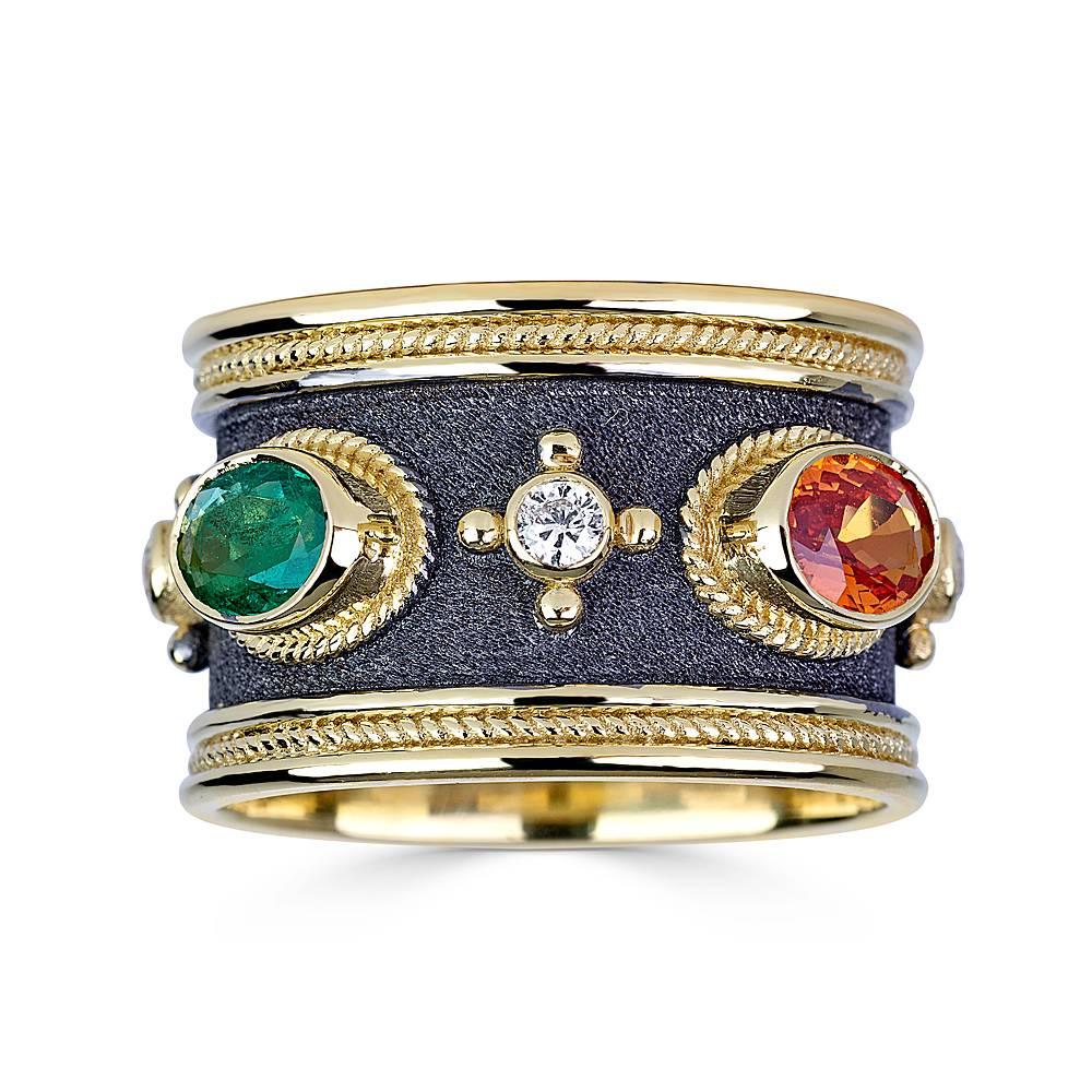 S.Georgios designer 18 Karat Solid Yellow Gold Wide Band Ring all microscopically decorated with the Byzantine granulation and the unique velvet look on the background finished in Black Rhodium. This gorgeous ring features 3 multicolor oval shape