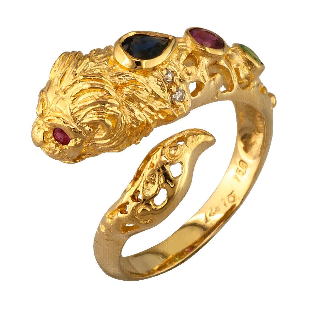 This S.Georgios unique designer Lion Band Ring is 18 Karat Yellow Gold and all handmade with granulation workmanship creating a stunning Lions head, A Greek symbol of strength. This gorgeous band ring features a pear-cut Blue Sapphire, 3
