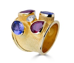 Georgios Collections 18 Karat Yellow Gold Diamond Tanzanite and Ruby Wide Ring