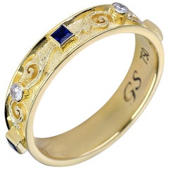 Anello unisex con diamante e zaffiro in oro giallo 18 carati Georgios Collections