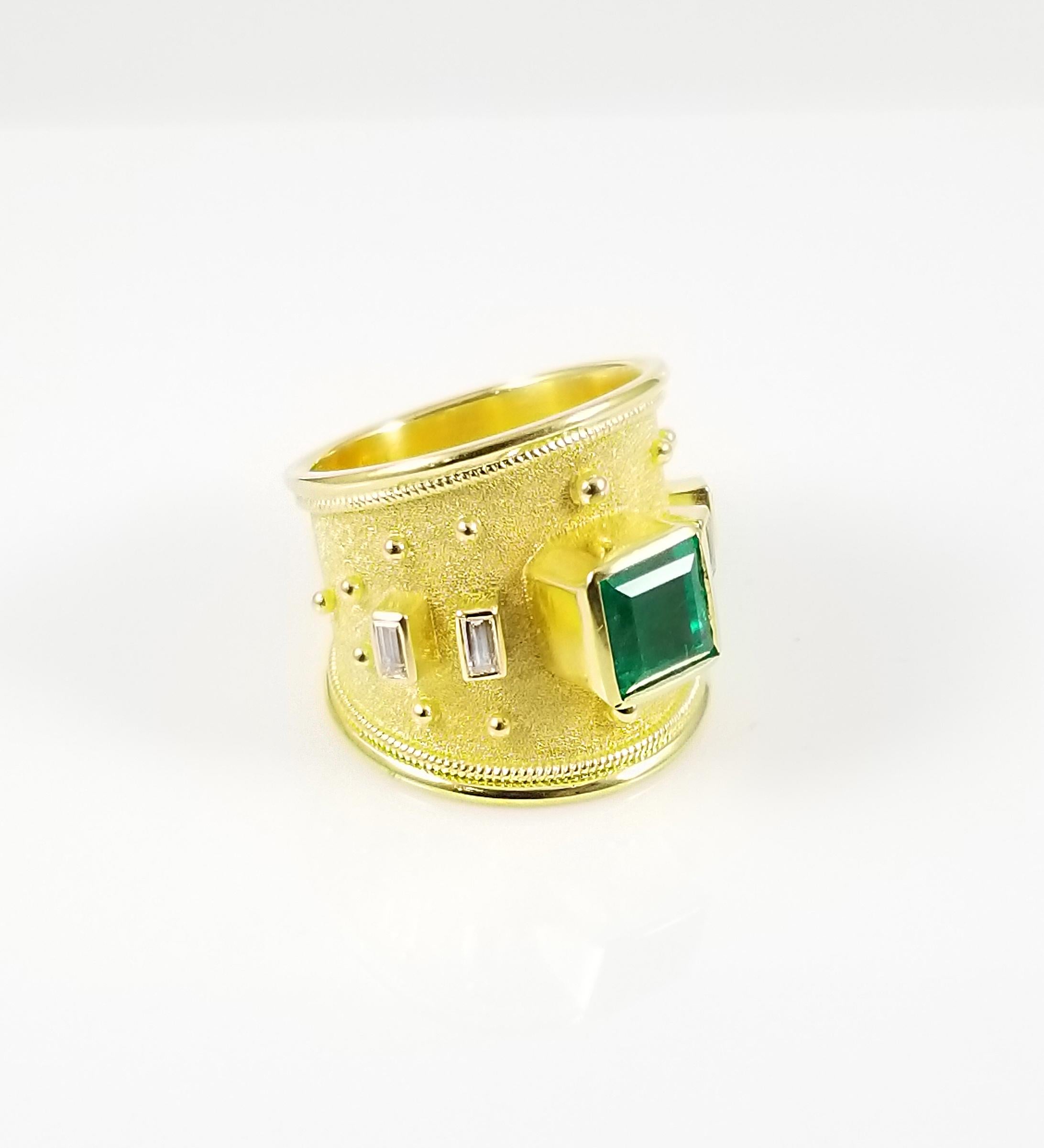 S.Georgios designer 18 Karat Solid Yellow Gold Ring all handmade with the Byzantine granulation workmanship and a unique velvet background all done under a microscope. The stunning ring has a center emerald cut Natural Emerald total weight of 2,38