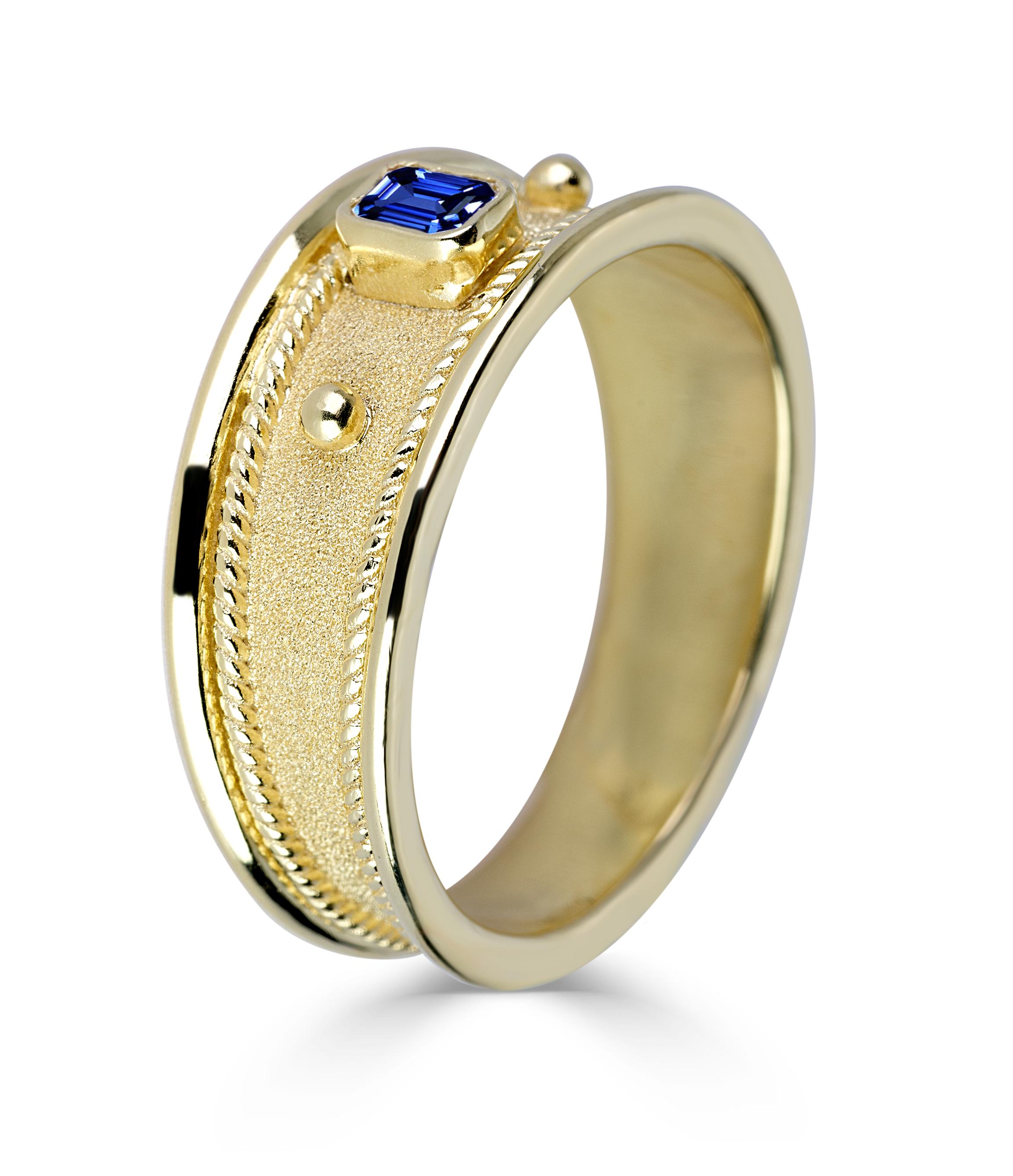 S.Georgios designer band ring in solid 18 Karat Yellow Gold all handmade with Byzantine workmanship and the unique velvet effect on the background. The granulation on this gorgeous ring has decorations of 22 Karat solid gold. This stunning unisex