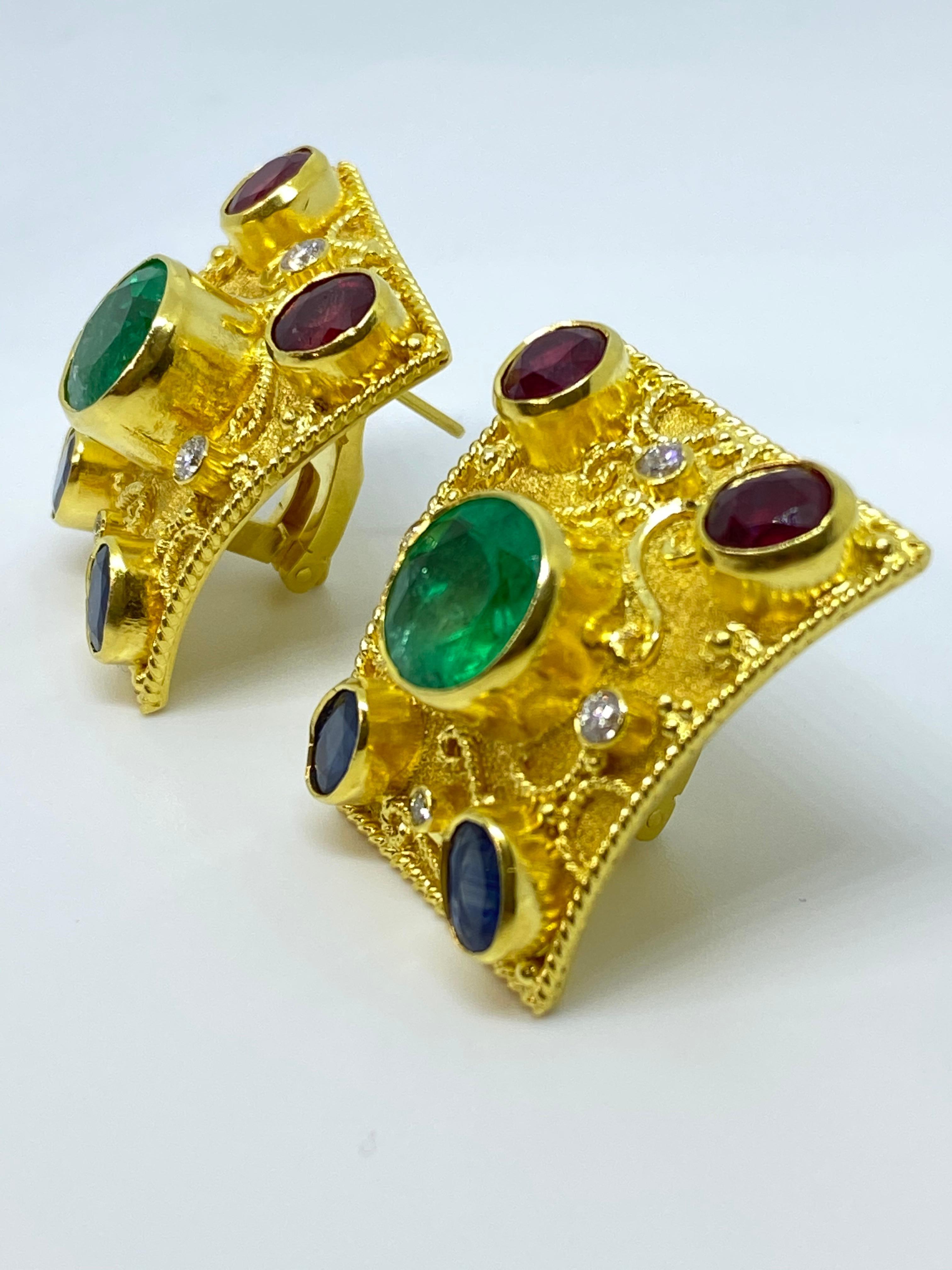 This S.Georgios designer one-of-a-kind pair of earrings are all hand made from 18 Karat Yellow Gold and are decorated with Byzantine-era style granulation workmanship done piece by piece microscopically. These beautiful curved earrings feature 2