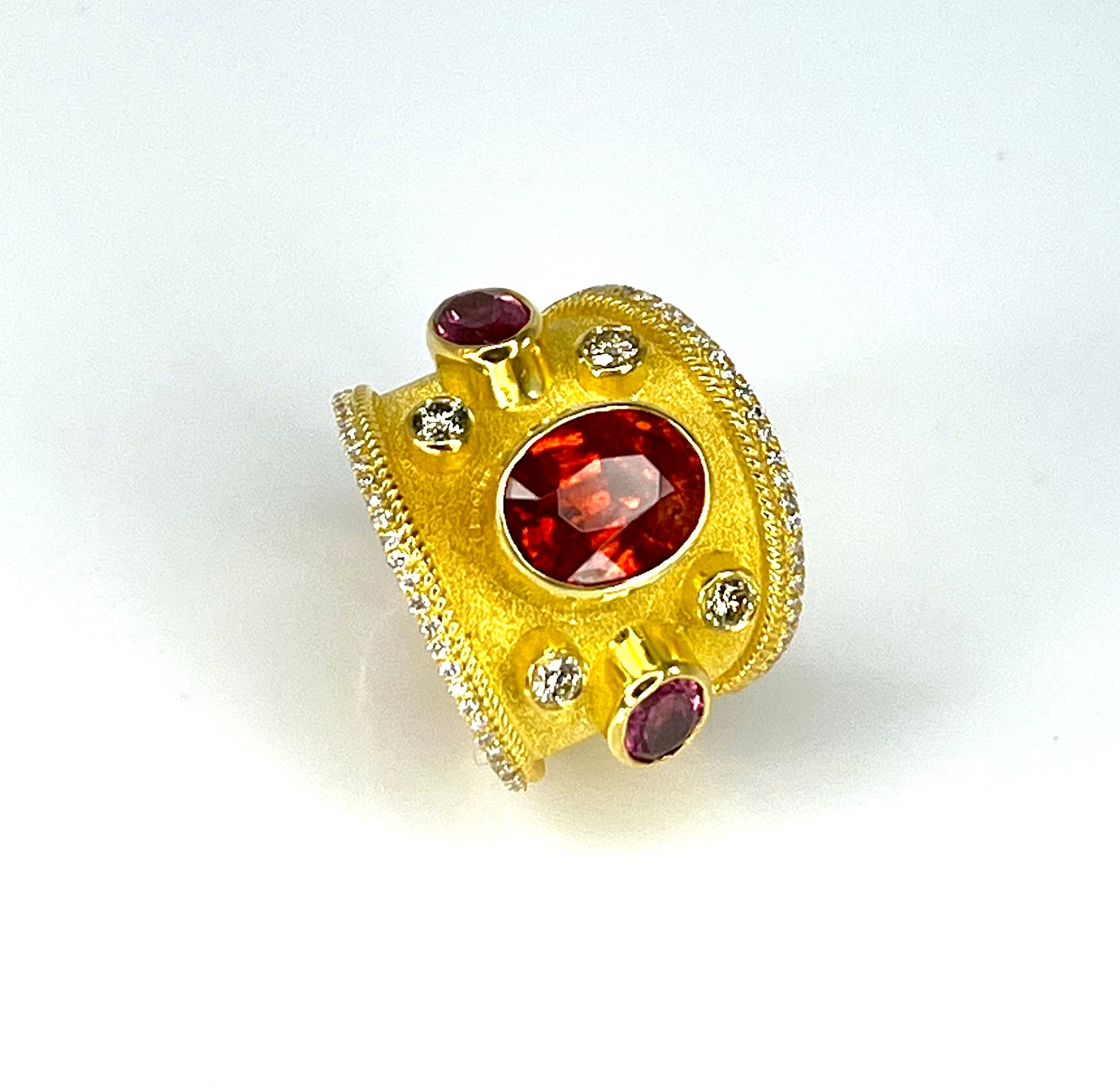 Admiring S.Georgios designer 18 Karat Solid Yellow Gold Wide Ring all handmade in Byzantine style with a stunning unique velvet background and twisted wires. This gorgeous ring features an oval cut 1.30 Carat Mexican Fire Opal center and two oval