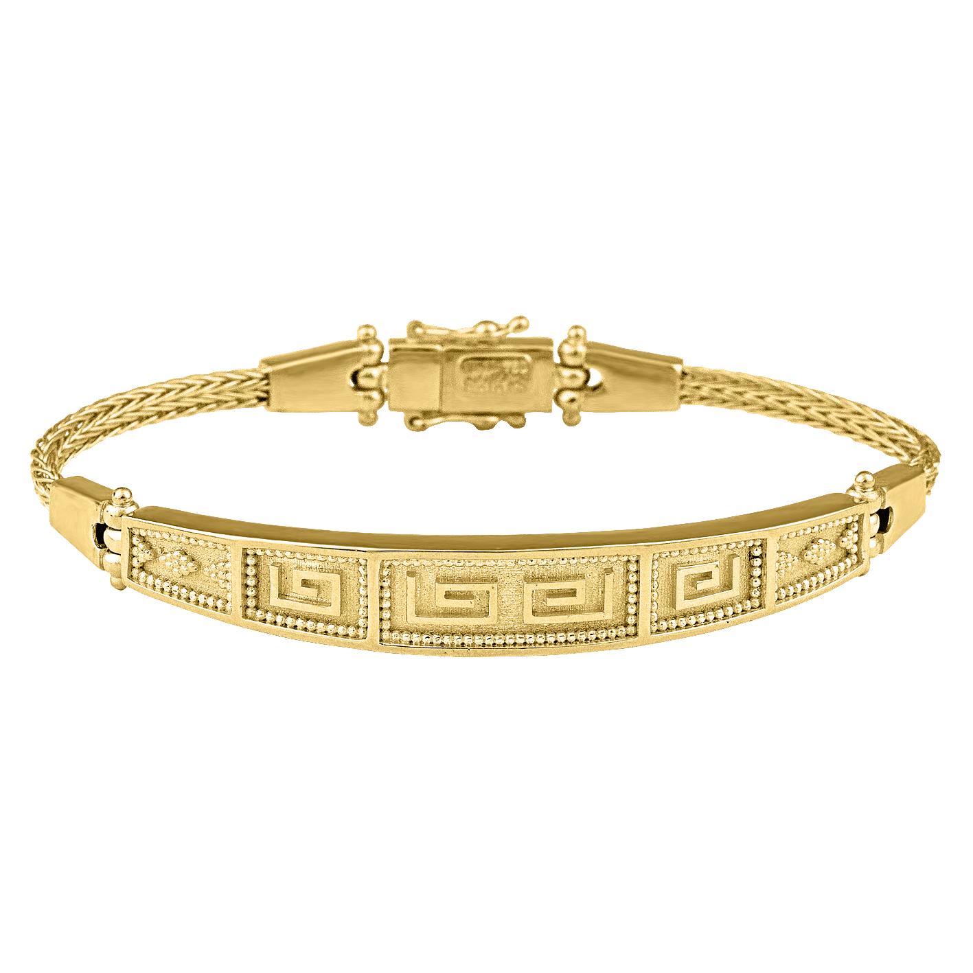S.Georgios designer bracelet in solid yellow gold 18 karats all handmade with the Greek Key design, the symbol of eternal life. The Bracelet is custom made and has beautiful granulation work and hand-knitted rope parts. The clasp has second-level