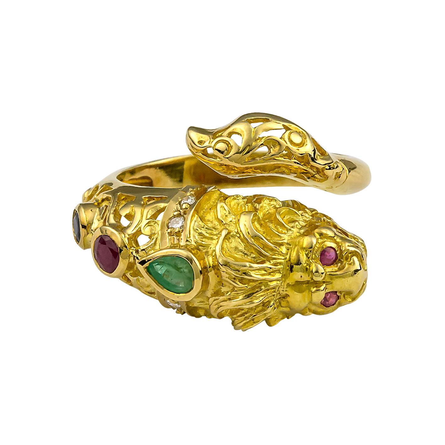 This S.Georgios Hand Made 18 Karat Yellow Gold Lionhead diamond Ring is decorated with Byzantine-era workmanship. This Lionhead ring -which is a symbol of strength, features white brilliant-cut Diamonds on the head total weight of 0.06 Carat, and an