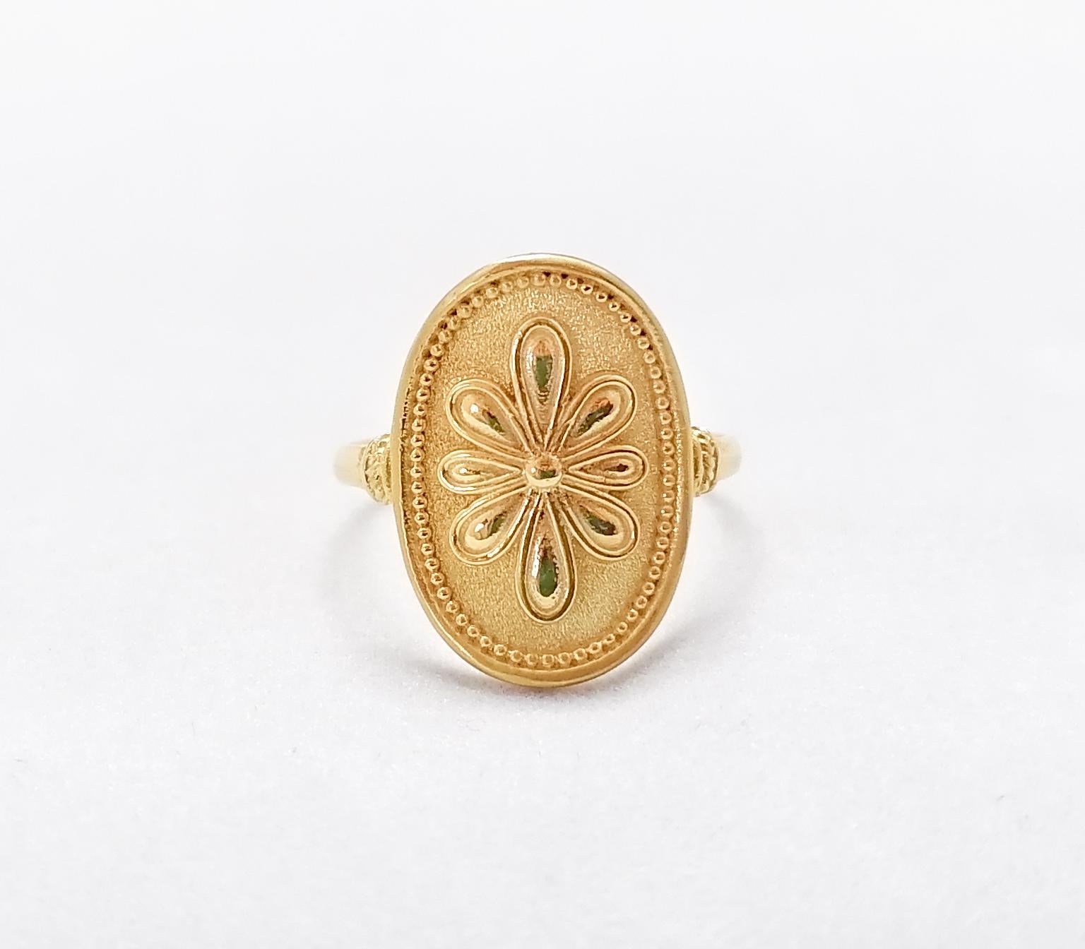 This S.Georgios designer ring is handmade from solid 18 Karat Yellow Gold. This gorgeous oval ring is microscopically decorated with Byzantine-style granulation work to create a stunning and elegant floral art piece.
We also make this beautiful ring