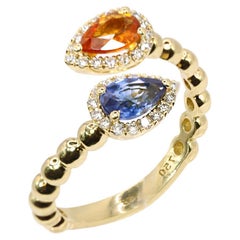 Georgios Collections Ring aus 18 Karat Gelbgold mit birnenförmigem orangefarbenem und blauem Saphir