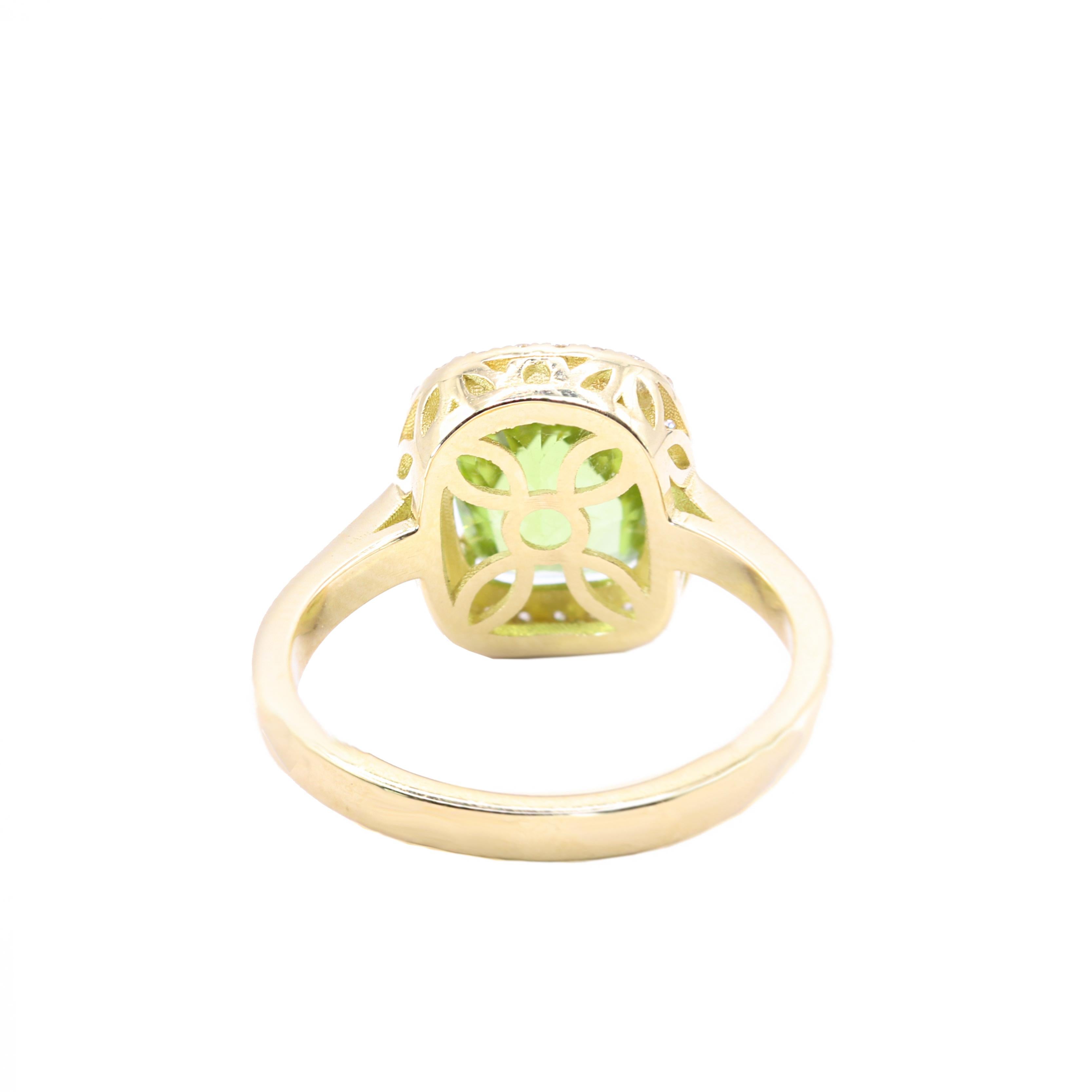 Oval Cut Georgios Collections 18 Karat Yellow Gold Peridot Ring with Diamond Bezel For Sale