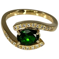 Georgios Collections 18 Karat Gelbgold Ring mit ovalem Tsavorit und Diamanten