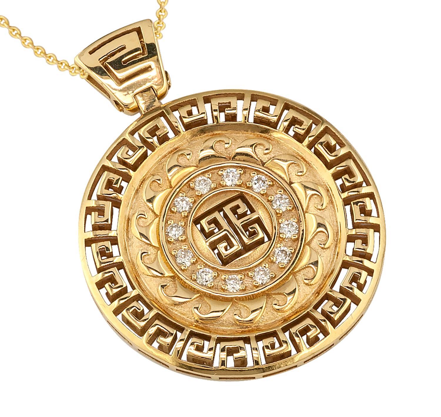 This S.Georgios designer pendant necklace is handmade from solid 18 Karat Yellow Gold and is microscopically carved with a unique Greek Key design to create a stunning art piece. This beautiful pendant features 12 brilliant-cut White Diamonds with a