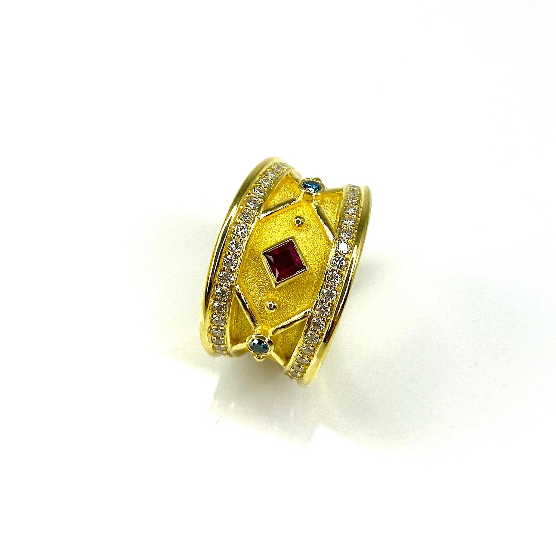 Georgios Kollektionen Ring aus 18 Karat Gelbgold mit Rubin und blauen und weißen Diamanten  (Moderne) im Angebot