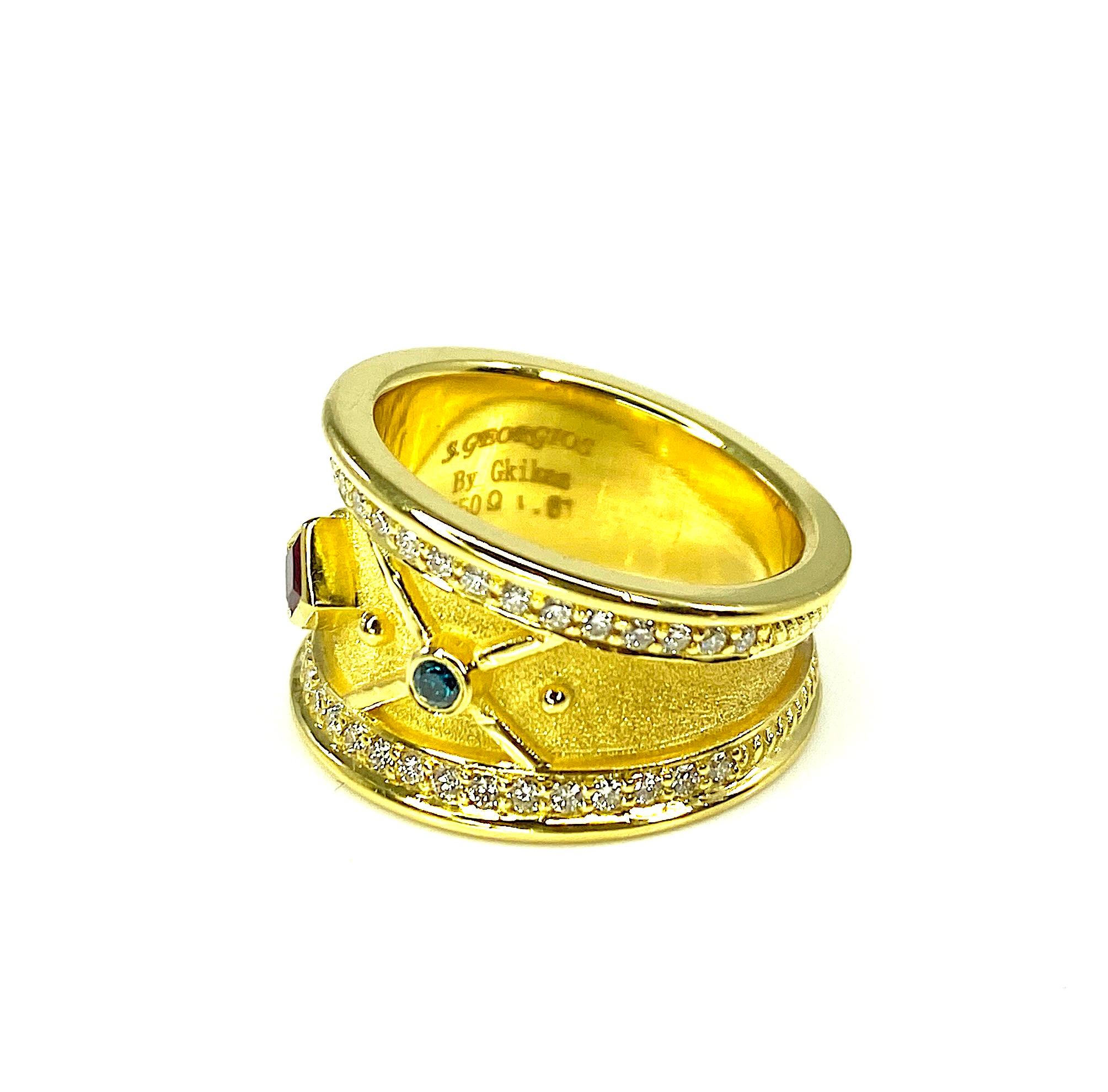 Georgios Kollektionen Ring aus 18 Karat Gelbgold mit Rubin und blauen und weißen Diamanten  Damen im Angebot