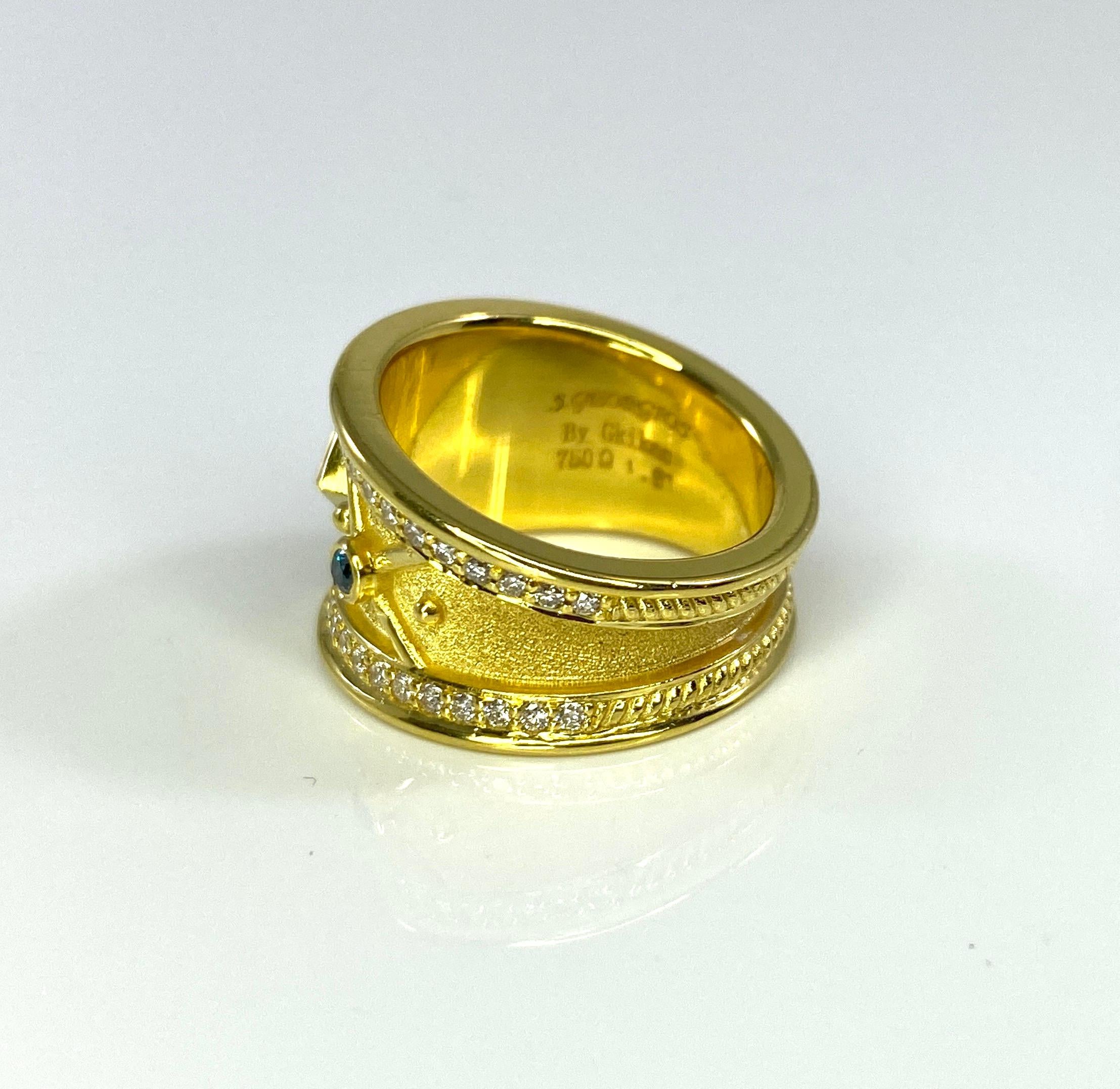 Georgios Kollektionen Ring aus 18 Karat Gelbgold mit Rubin und blauen und weißen Diamanten  im Angebot 1