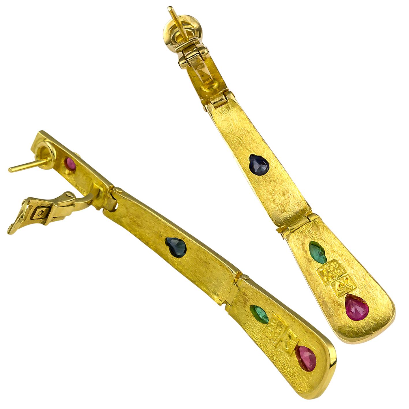 S.Georgios designer Earrings 18 Karat yellow gold all handmade and microscopically decorated with granulation workmanship and a unique velvet finish on the background. They feature Rubies, Sapphires and Emeralds total weight of 1,45 Carats and have
