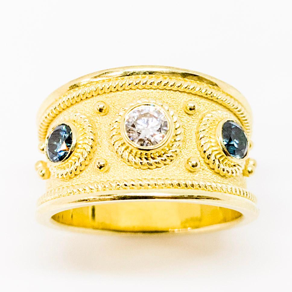 Round Cut Georgios Collections 18 Karat Yellow Gold Solitaire Blue and White Diamond Ring For Sale