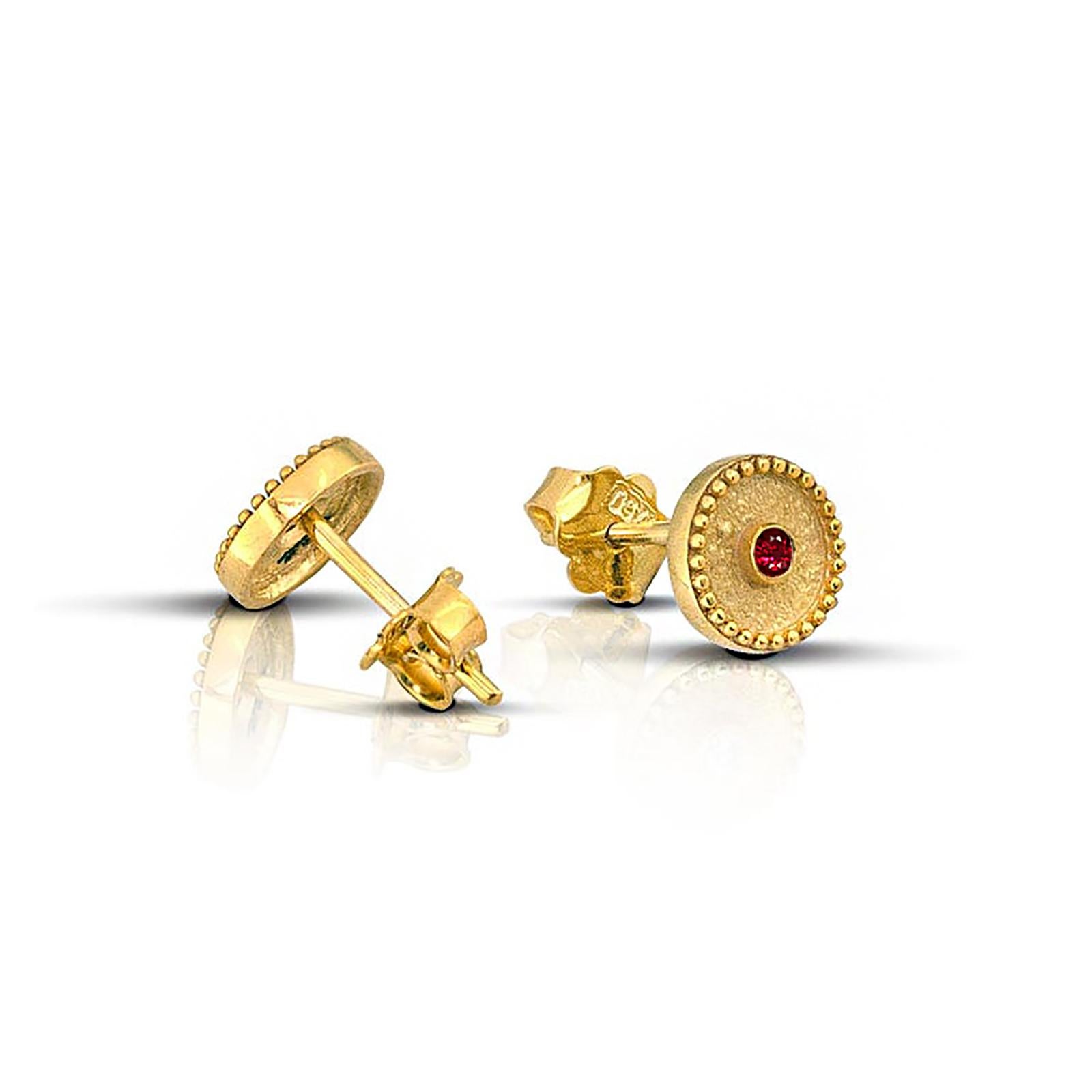 These S.Georgios stud Earrings are 18 Karat yellow gold and are all handmade. The stunning earrings are microscopically decorated with granulation workmanship and feature a unique velvet look on the background. They feature 2 Brilliant cut nature