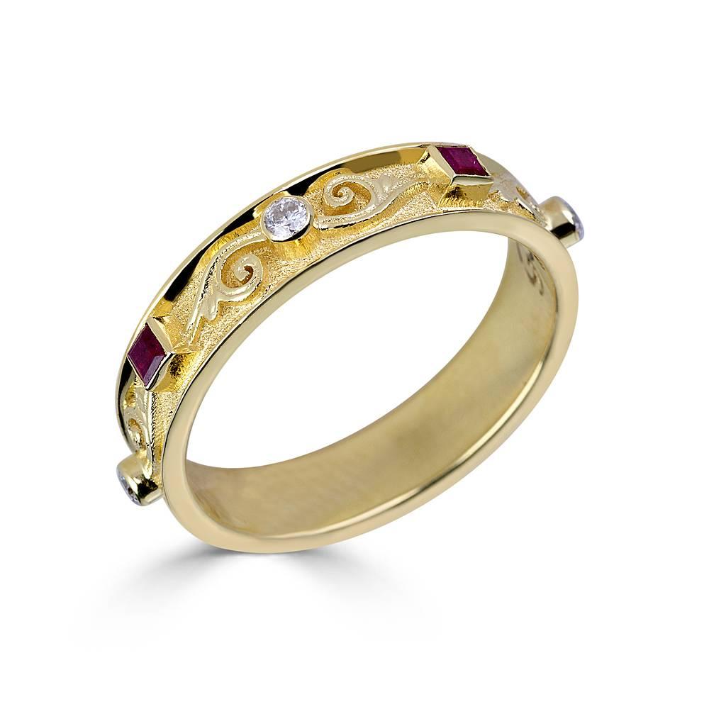 S.Georgios designer ring is handmade 18 Karat Yellow Gold. This gorgeous piece is microscopically decorated all around with gold beads and wires - granulation Byzantine work made all by hand. This beautiful band features 4 Brilliant cut Diamonds