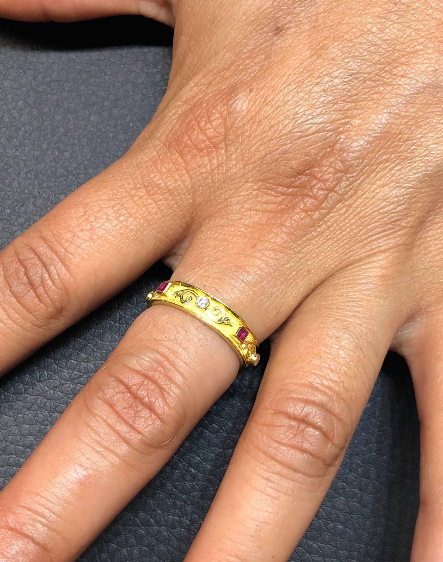S.Georgios design ring handmade from solid 18 Karat Yellow Gold. The ring is microscopically decorated all around with gold beads and wires - granulation Byzantine work made all by hand. This band features 4 Brilliant cut Diamonds total weight 0.15